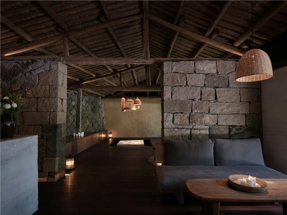 Modern living room with stone and concrete elements