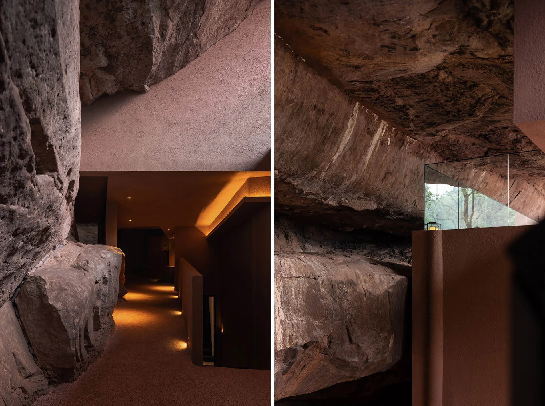 A modern interior space featuring stone walls and ceiling, with warm lighting and a sense of connection to nature.