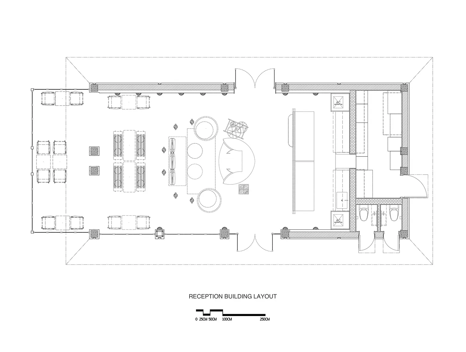 Floor plan of a reception area with seating arrangements, desks, and restroom facilities.