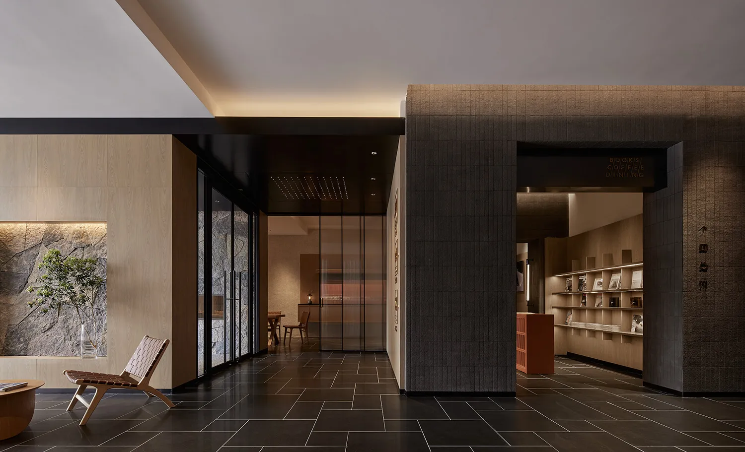 A modern office interior featuring concrete and wood materials.