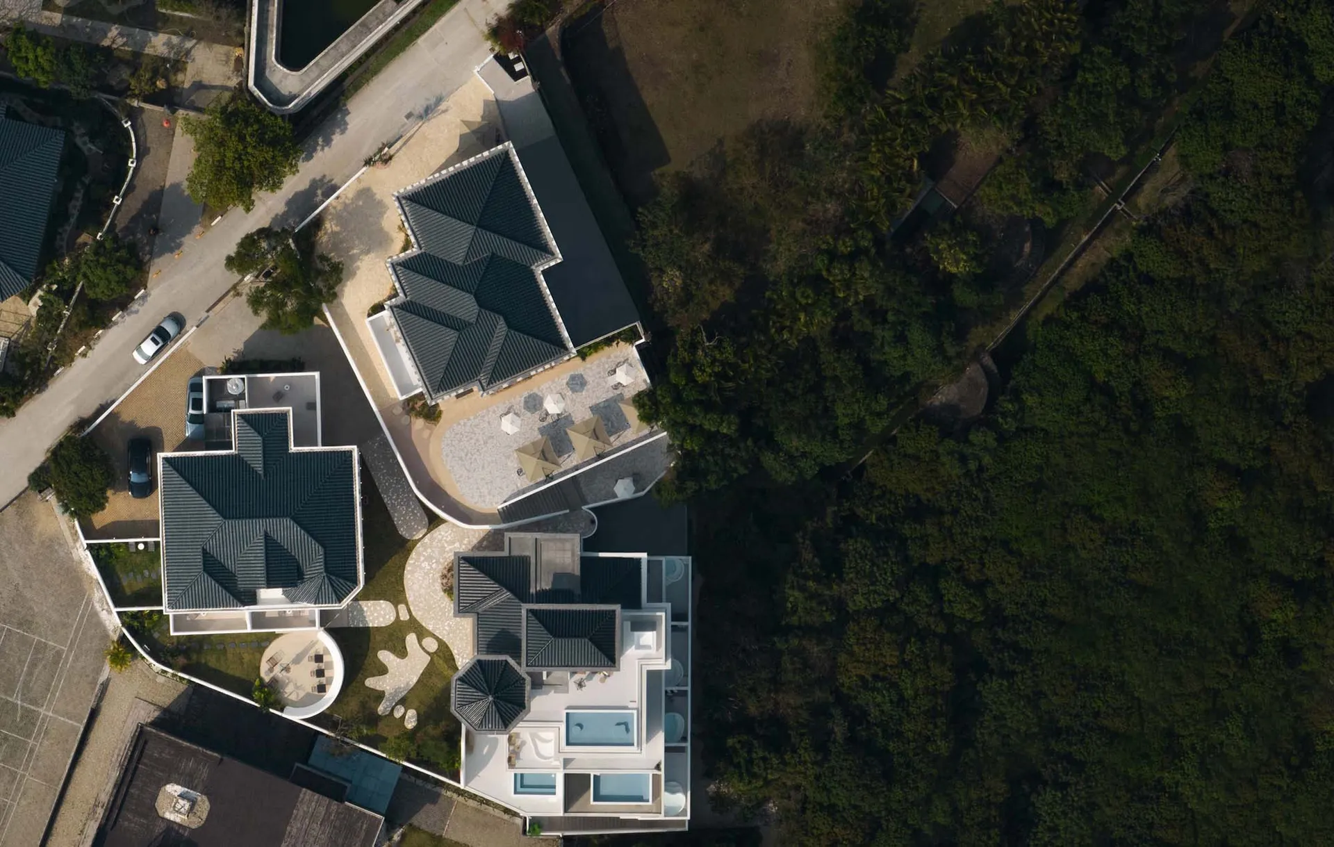 Aerial view of a modern vacation home with terrazzo flooring.
