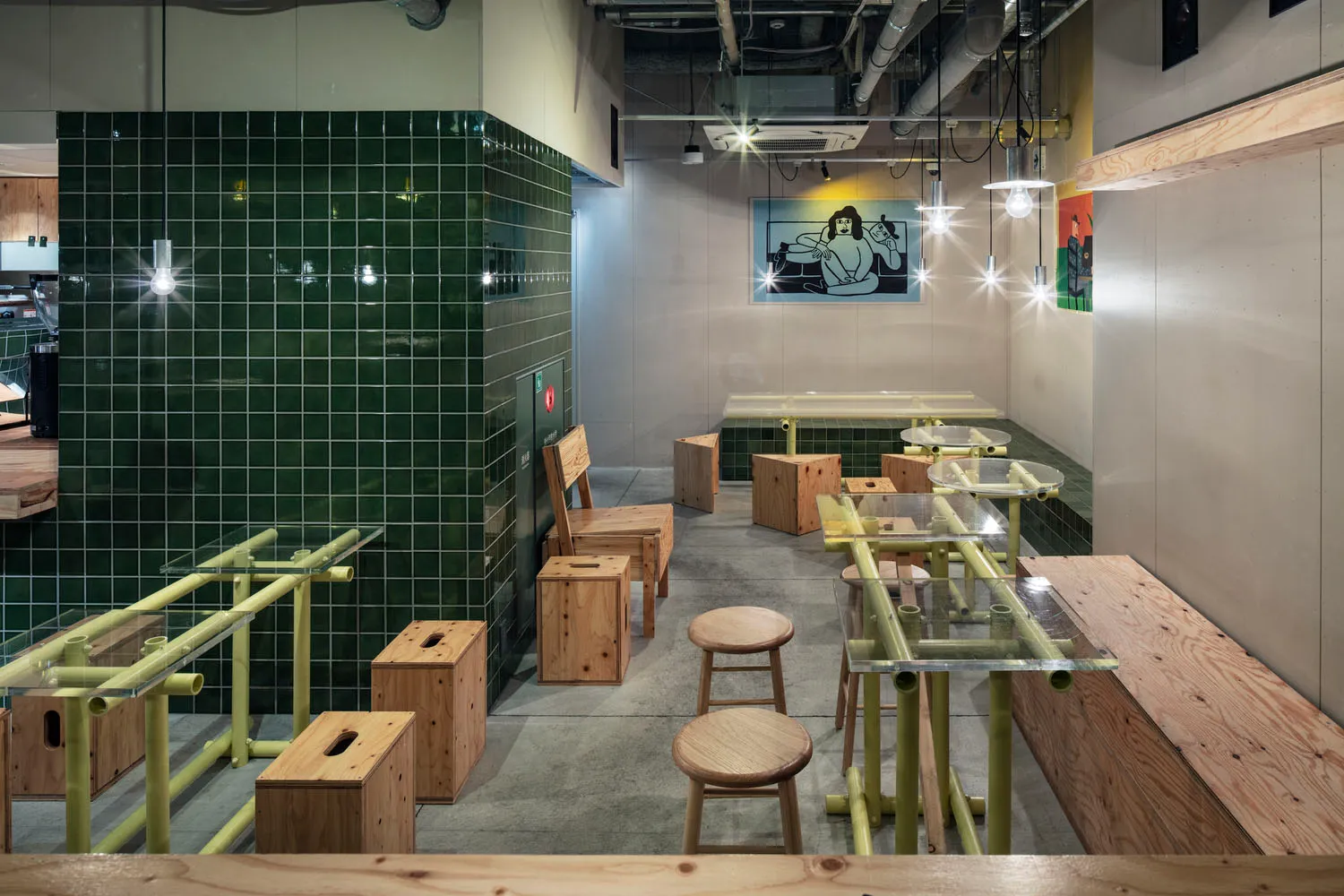 Interior design of a modern cafe bar with concrete, wood, and glass materials