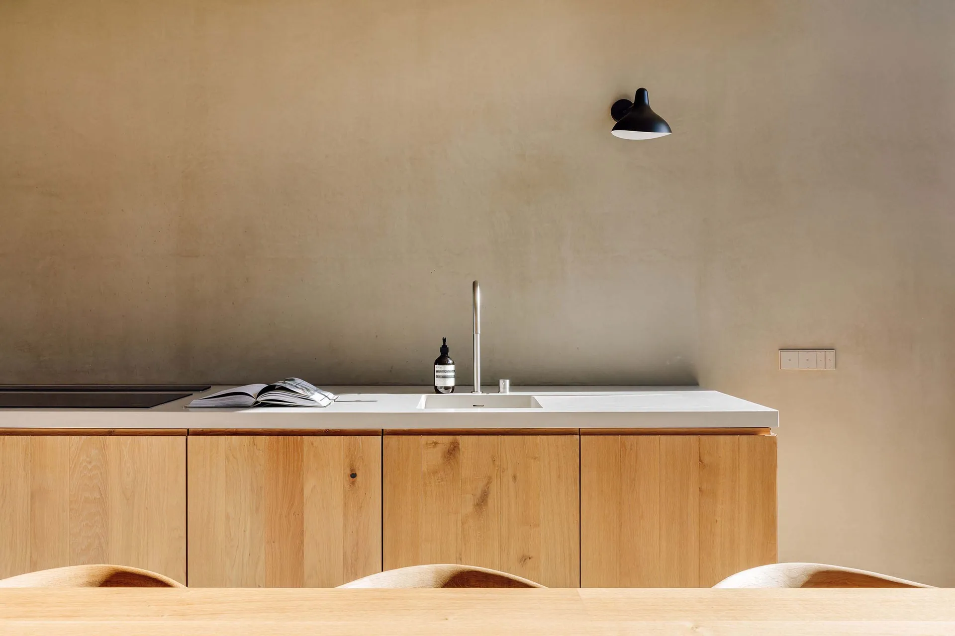 Modern kitchen with wood and concrete finishes