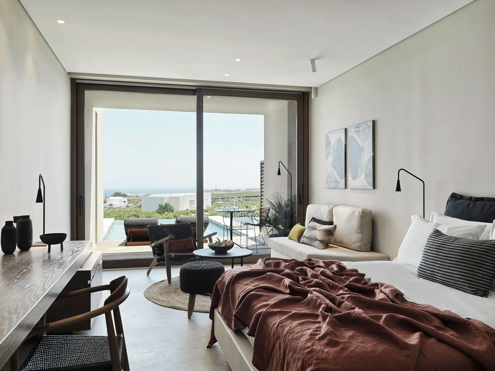 Modern residential interior with wood, glass, and concrete elements.