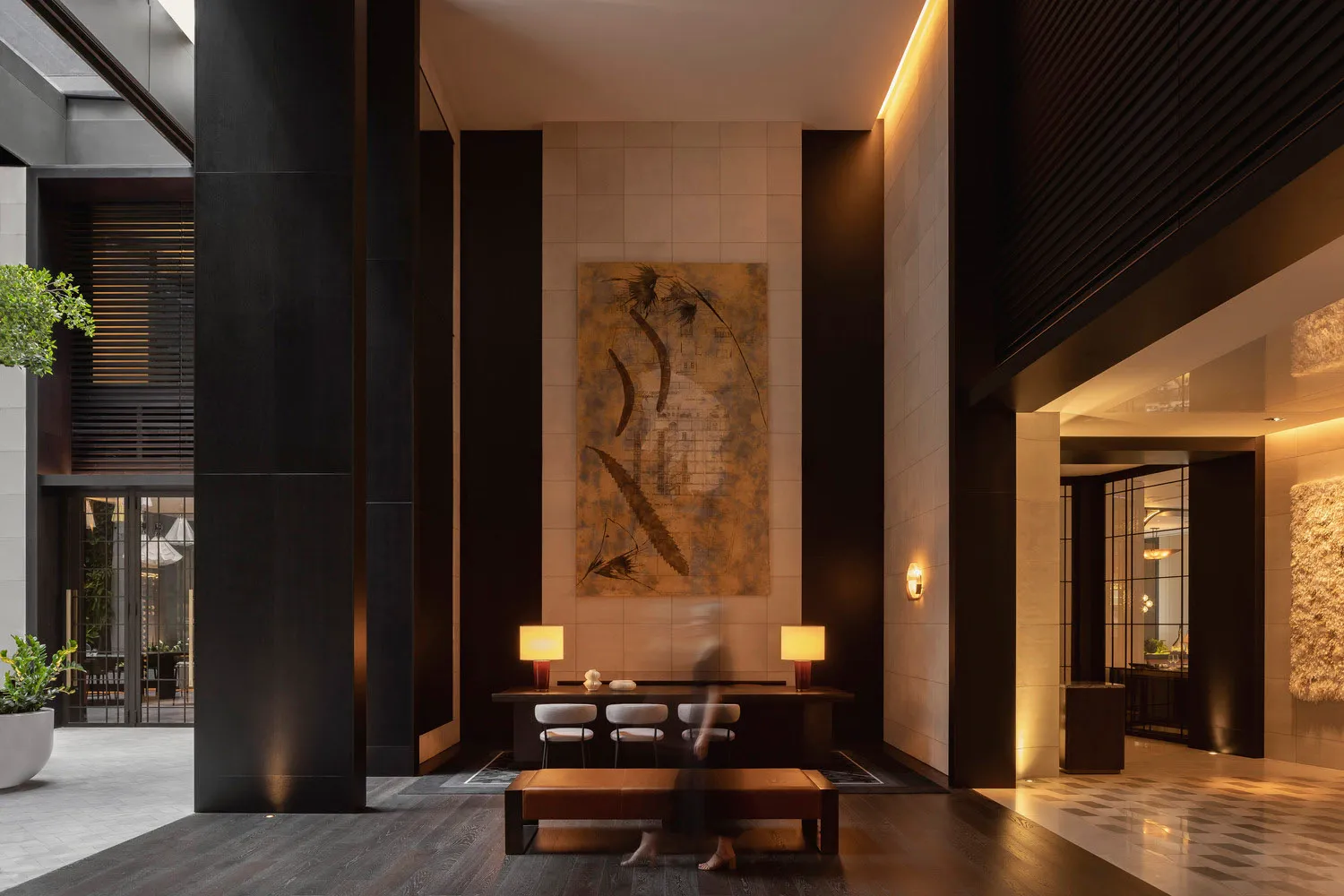 A modern industrial lobby with concrete and glass materials