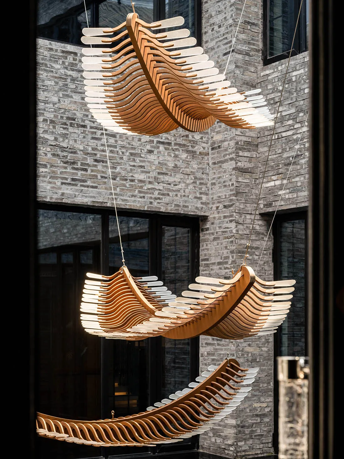 Modern wooden hanging sculptures