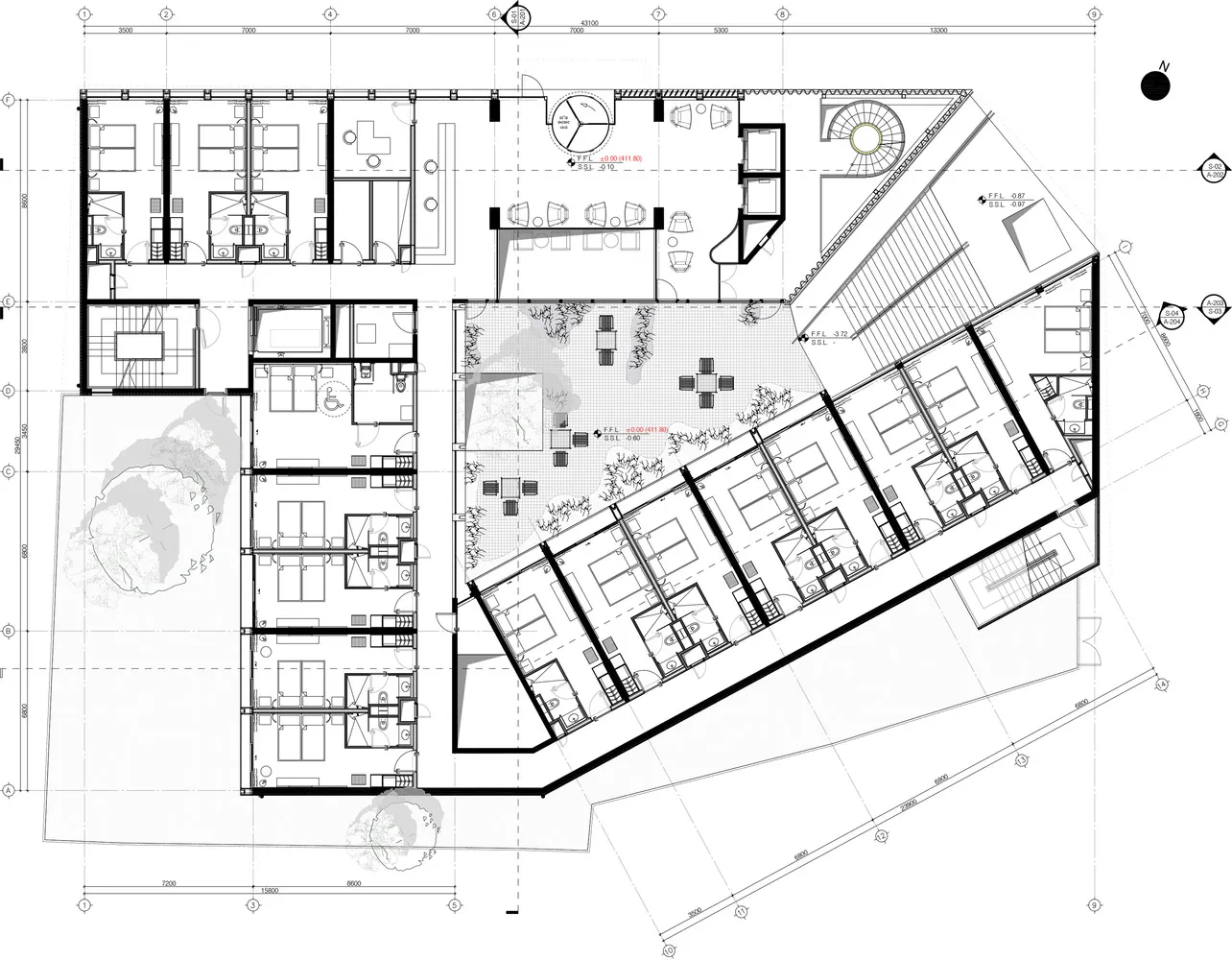 Black and white architectural drawing of an office layout with open spaces, cubicles, and conference rooms.