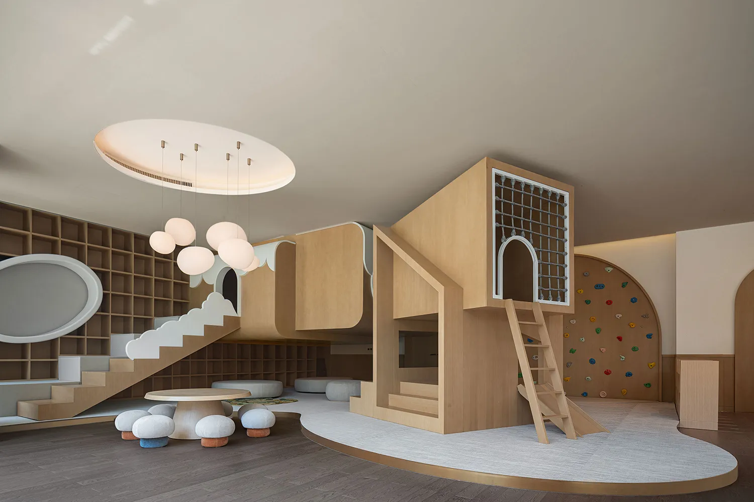 Modern minimalist design featuring a playroom with climbing wall, bookshelves, and carpeted flooring.