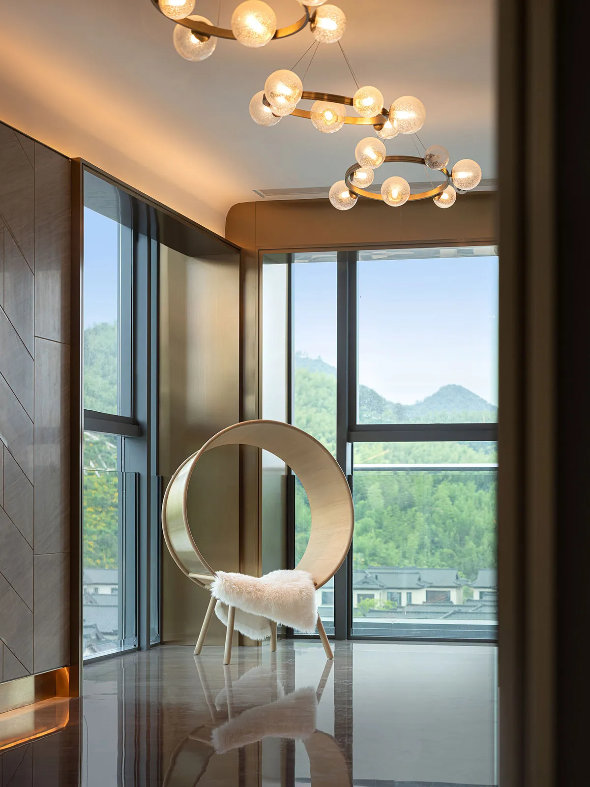 A modern living room with a large glass window