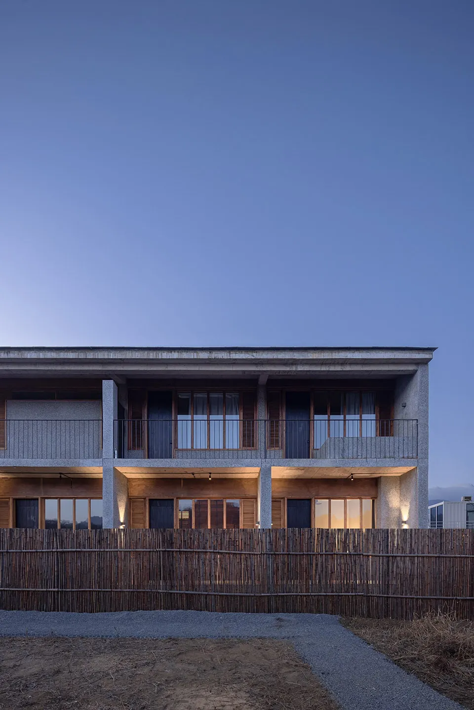 Modern building exterior made of stone with a minimalist design.