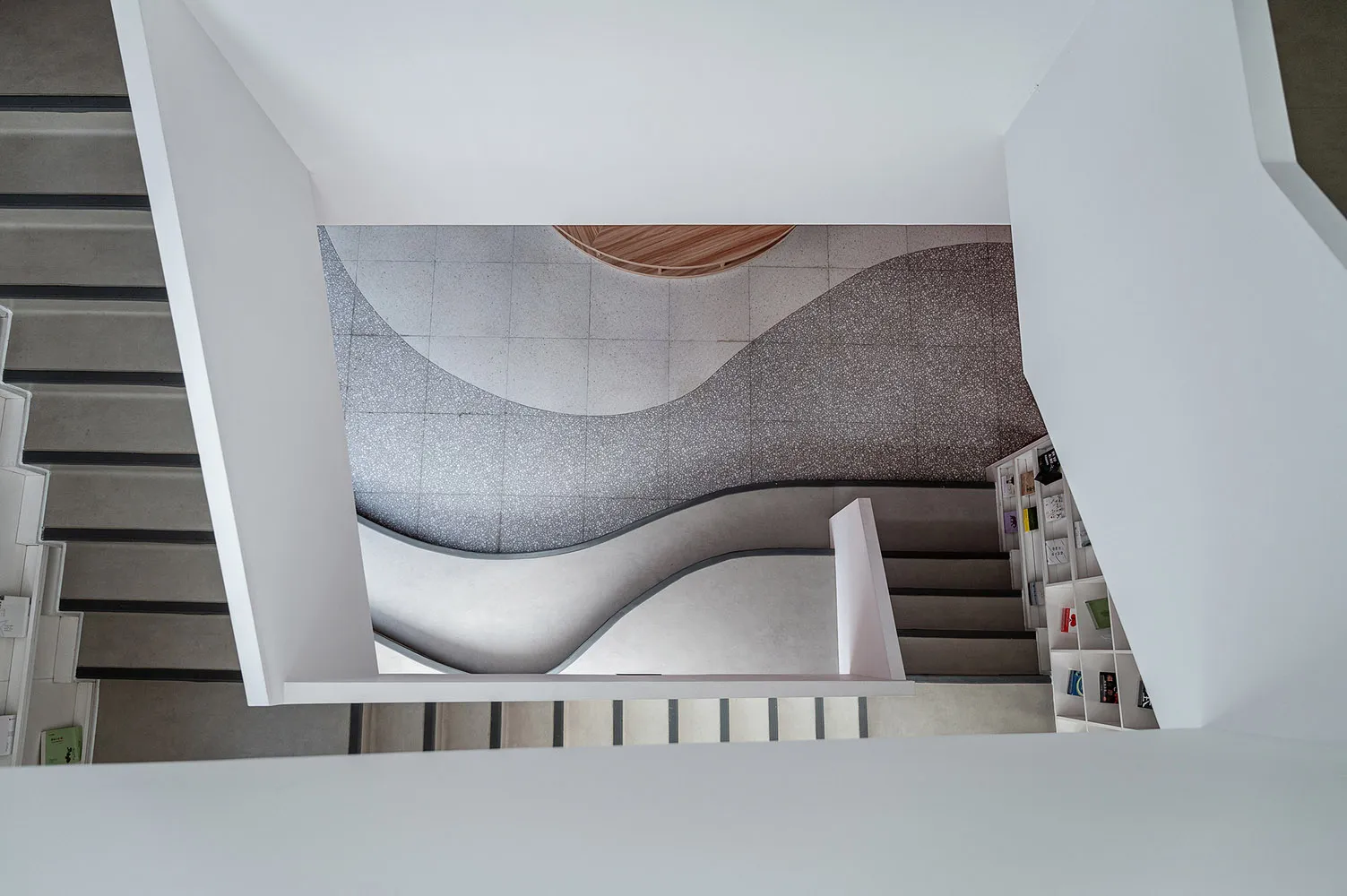 Modern interior featuring concrete walls and flooring.