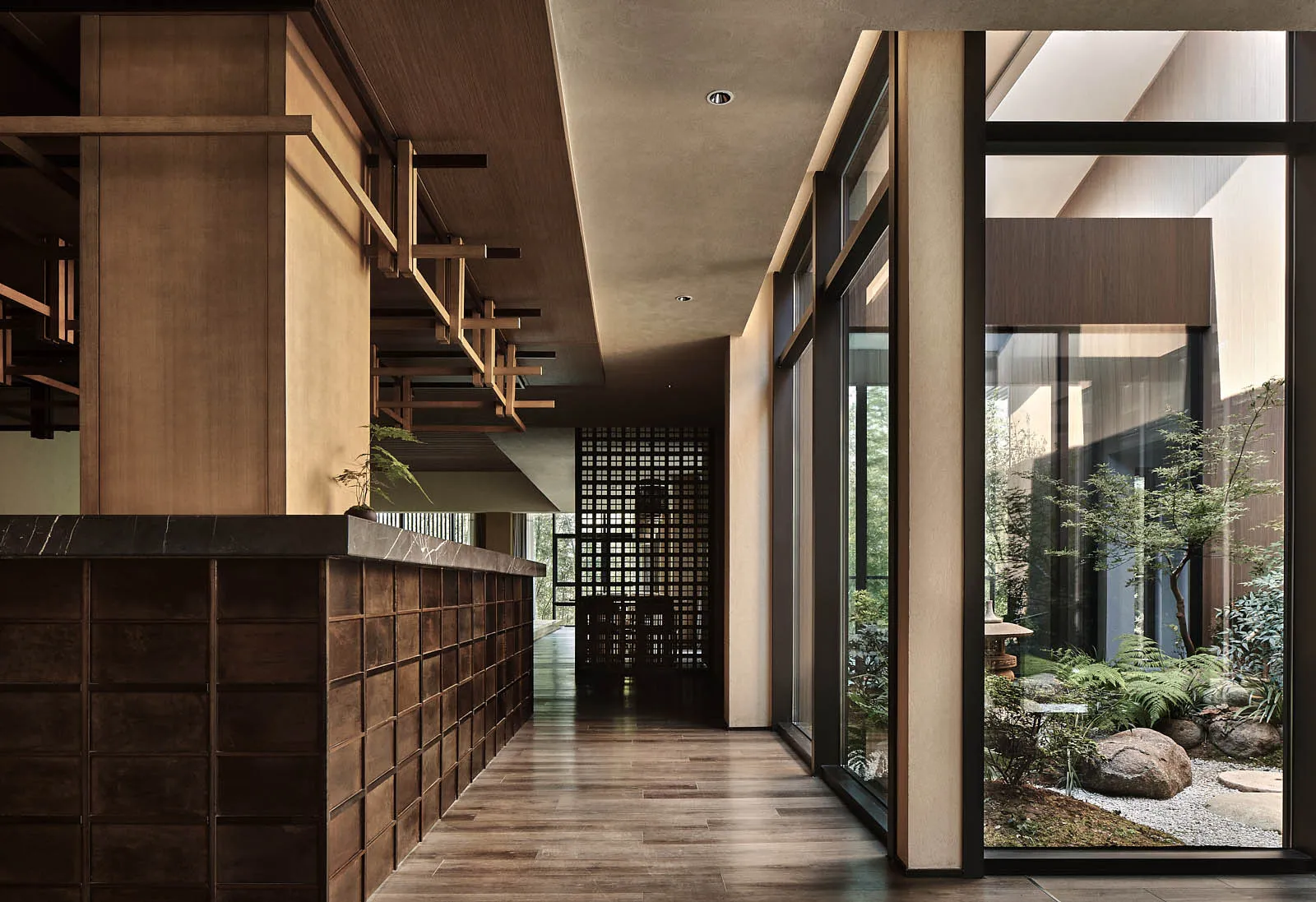 Modern living room featuring a mix of wood, glass, and concrete materials.