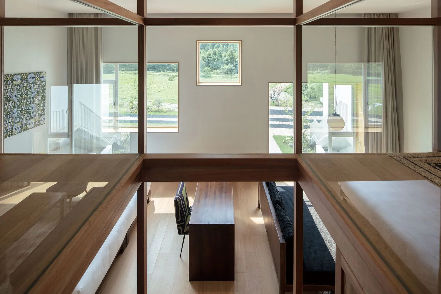 A minimalist living room with wooden elements.