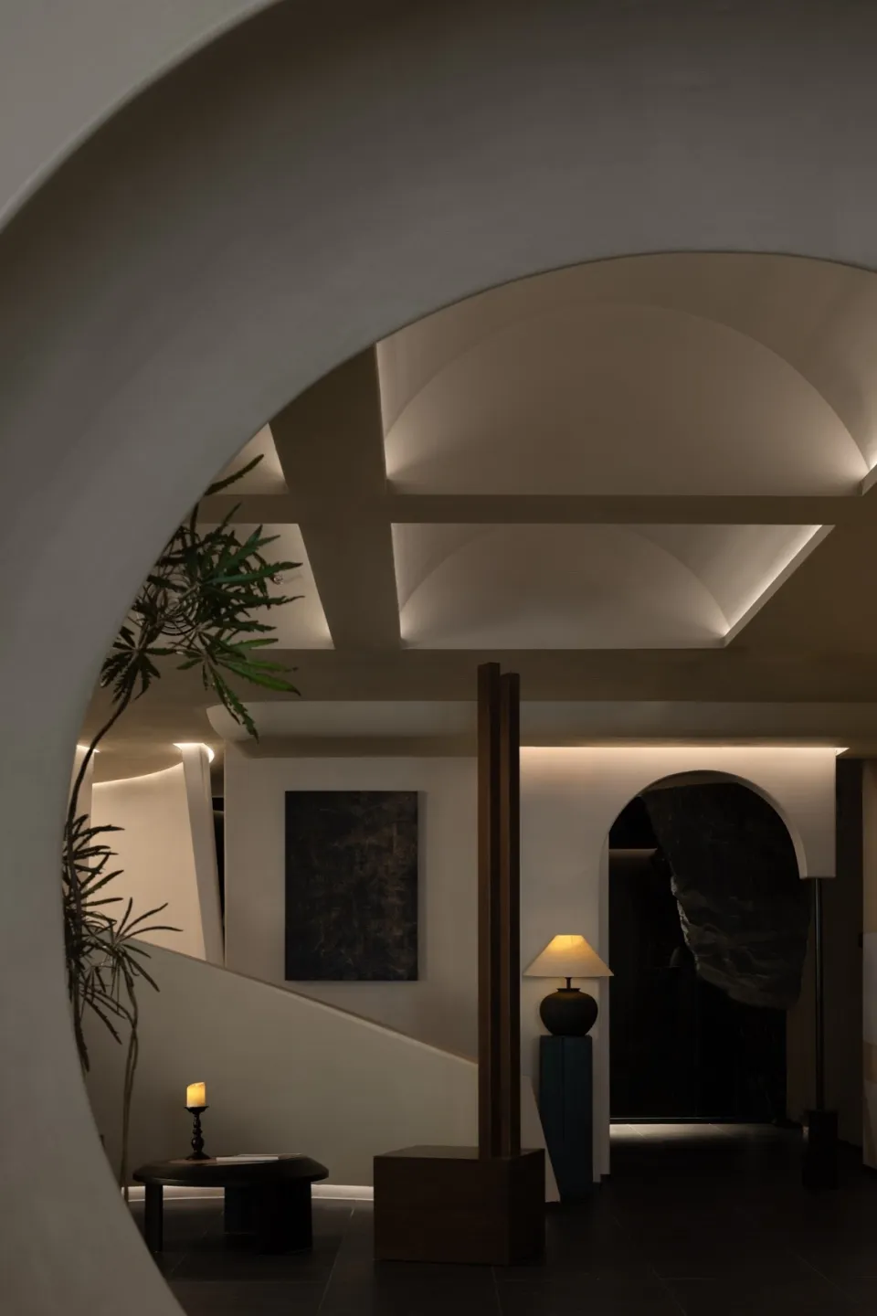 Modern minimalist hallway with concrete walls and stone flooring