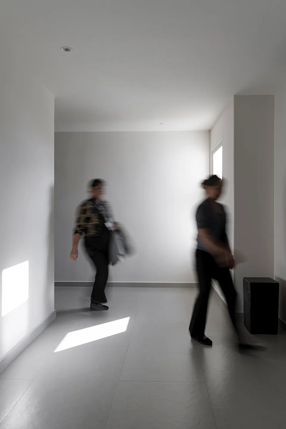 A minimalist interior design featuring concrete materials.