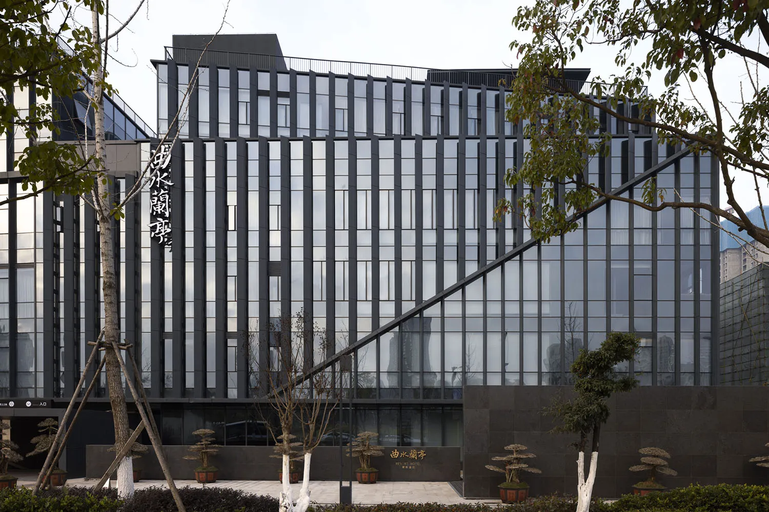 A modern building with a glass facade.