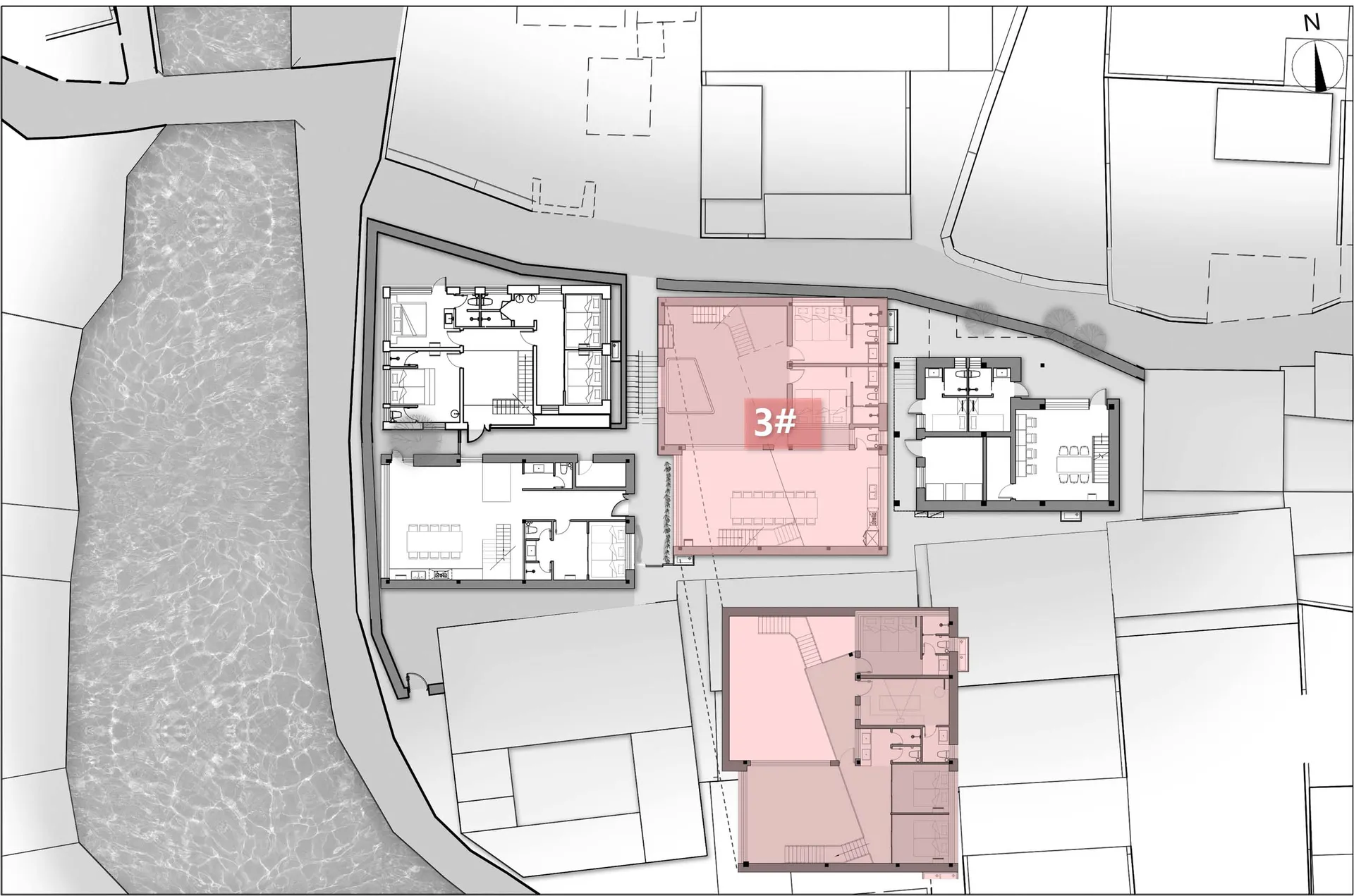 A residential architectural floor plan detailing apartment layouts and interior designs.