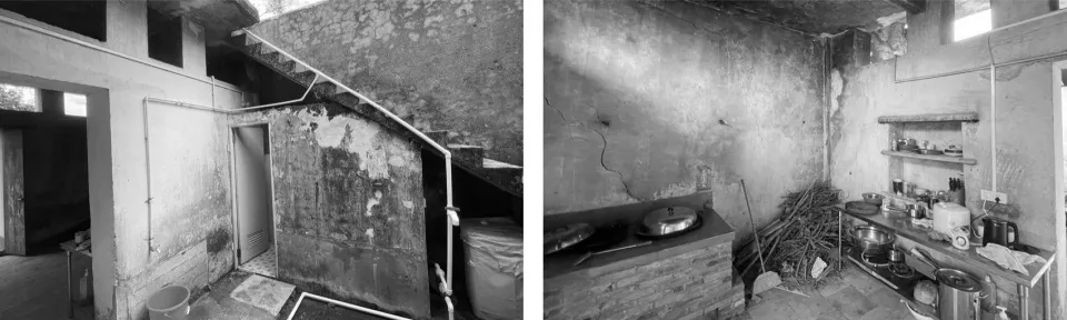 A cluttered, abandoned kitchen area with concrete walls and a mix of debris and cooking utensils.