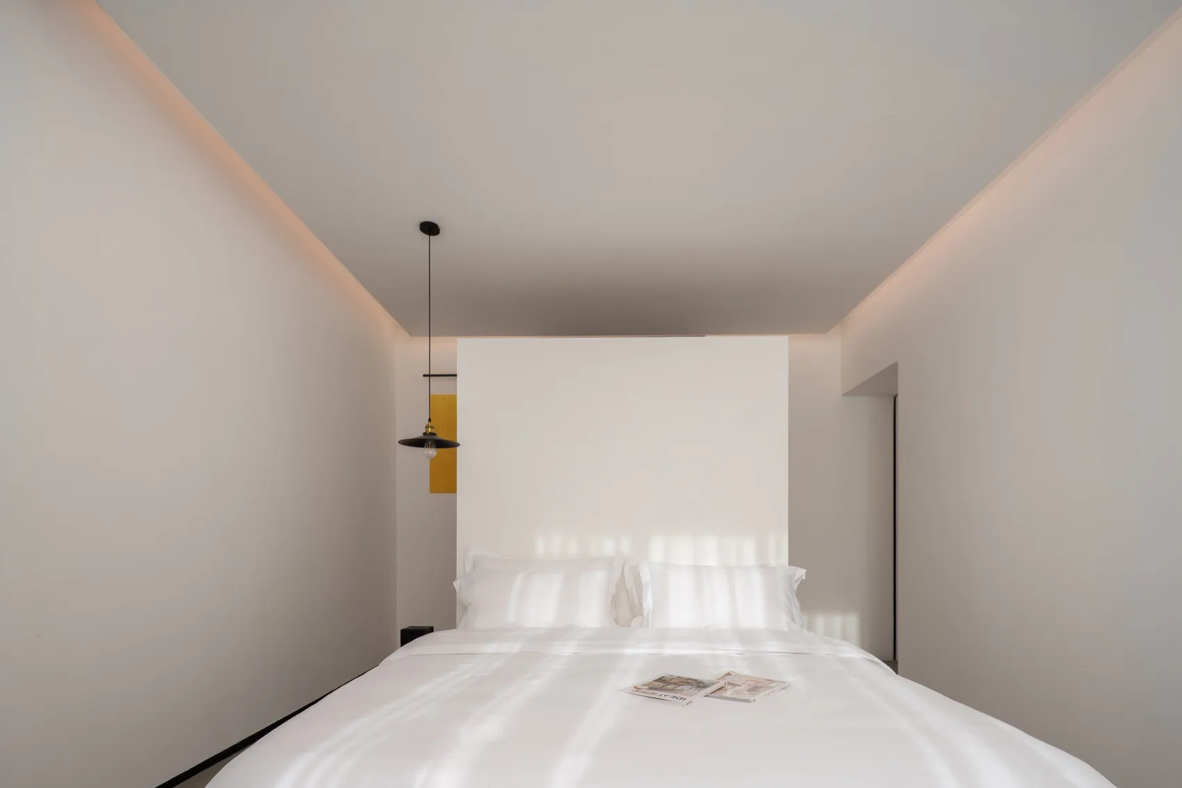 Modern bedroom with textured bedding and minimalist design