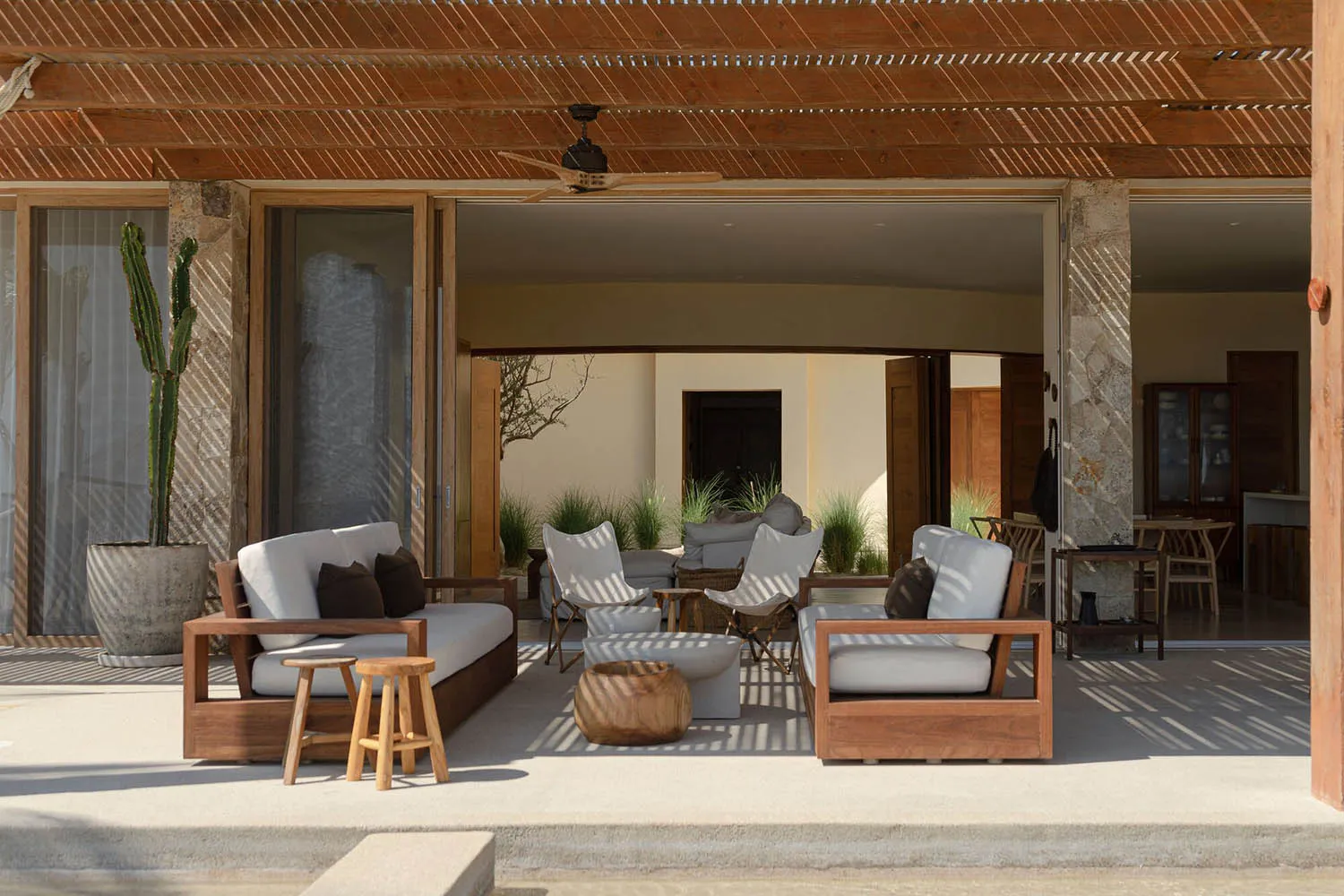 Contemporary living room featuring wooden furniture and comfortable seating.