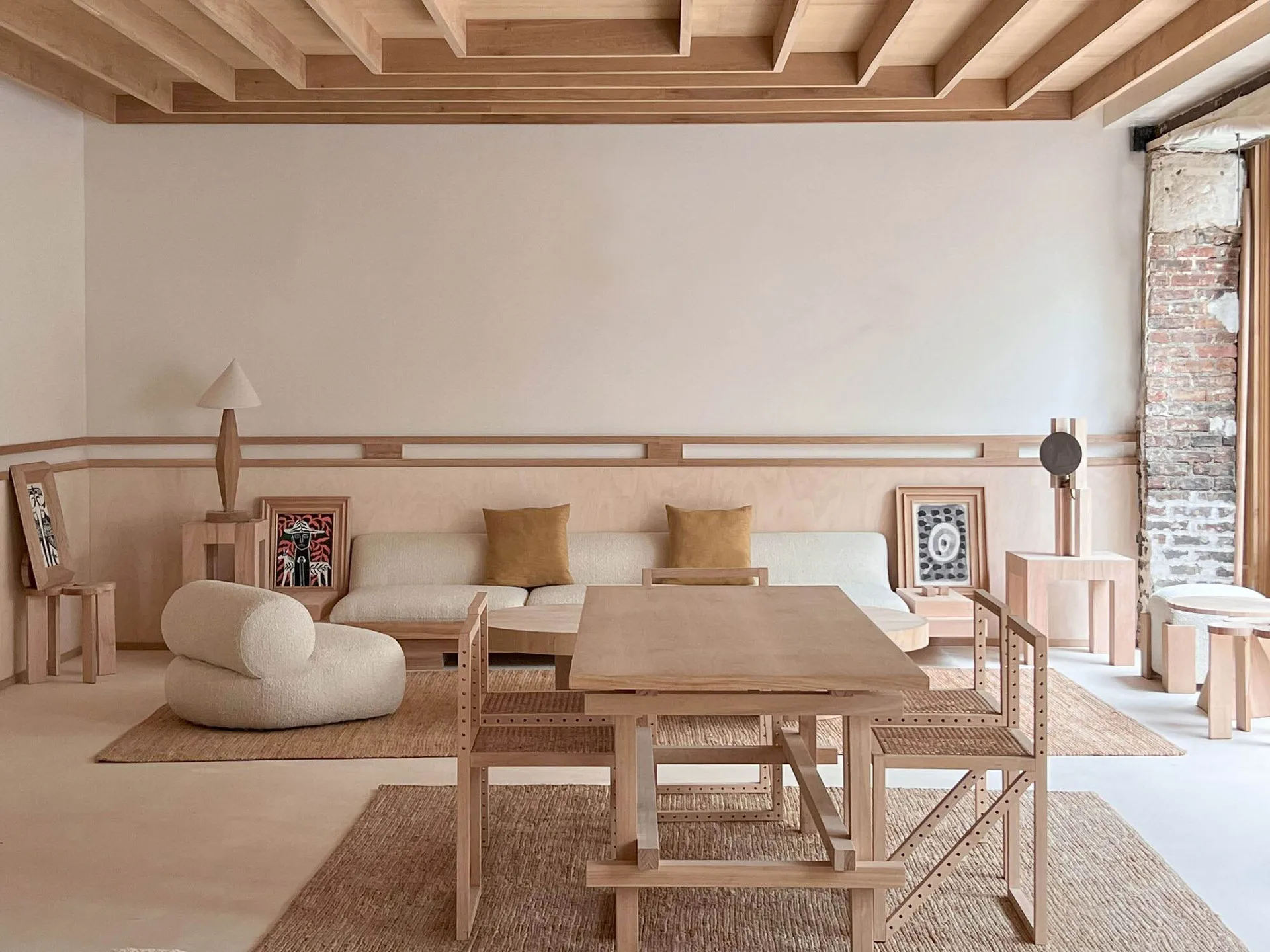 A modern living room featuring wooden furniture and neutral color palette.