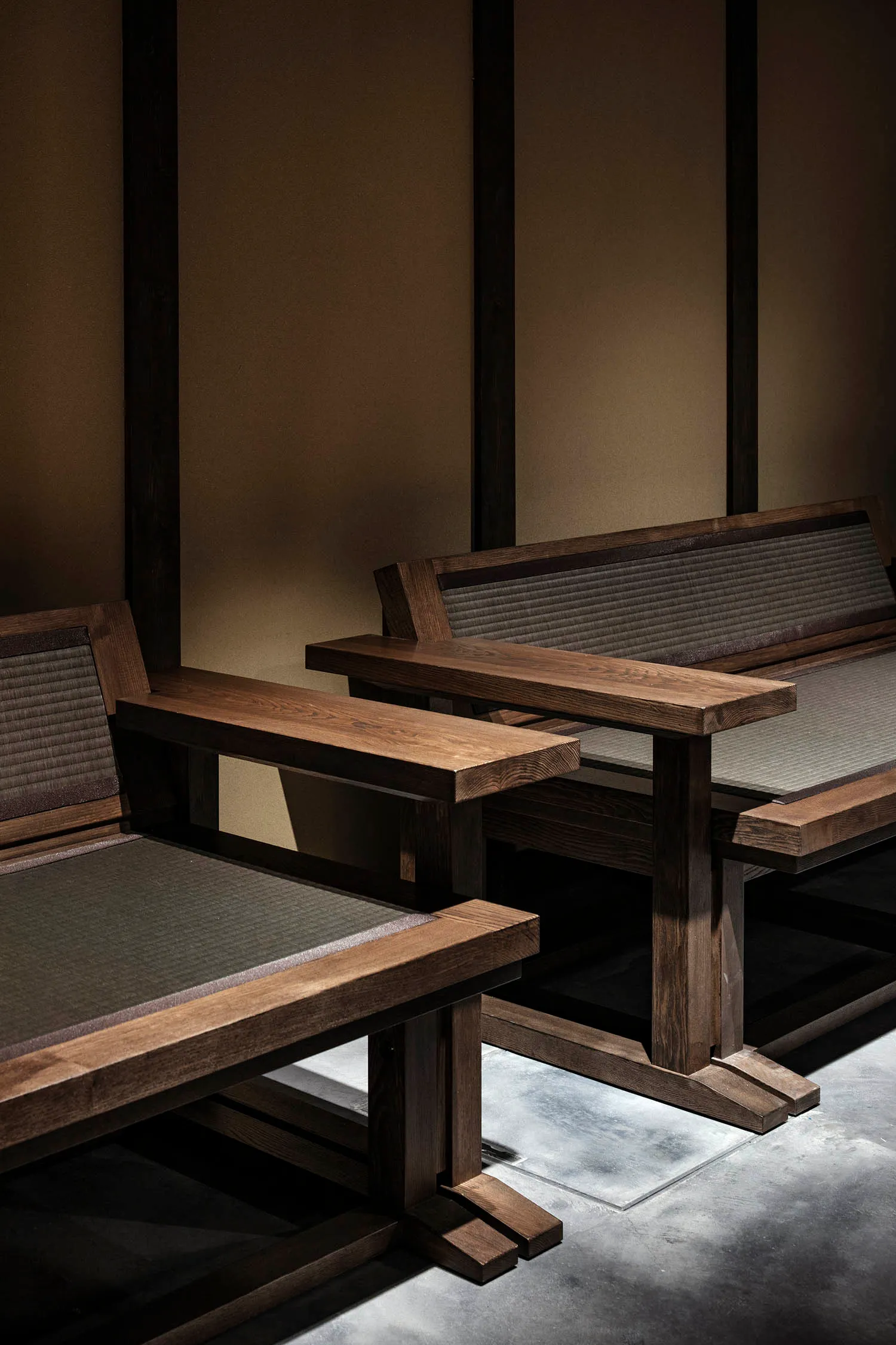 Modern, wooden furniture featuring minimalist design with dark wooden tones and matte finish.