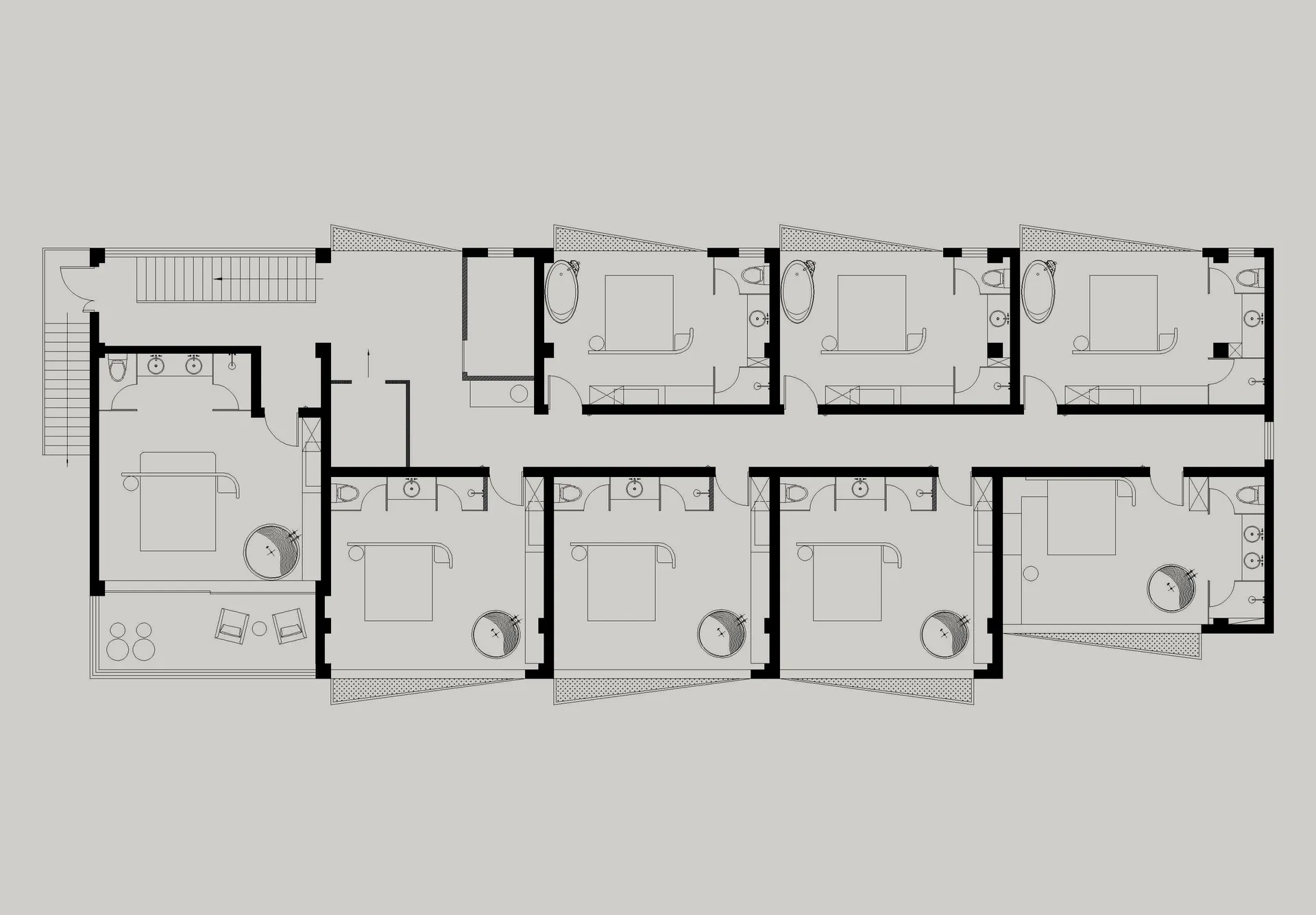 Floor plan of a modern apartment layout with multiple rooms and bathrooms.