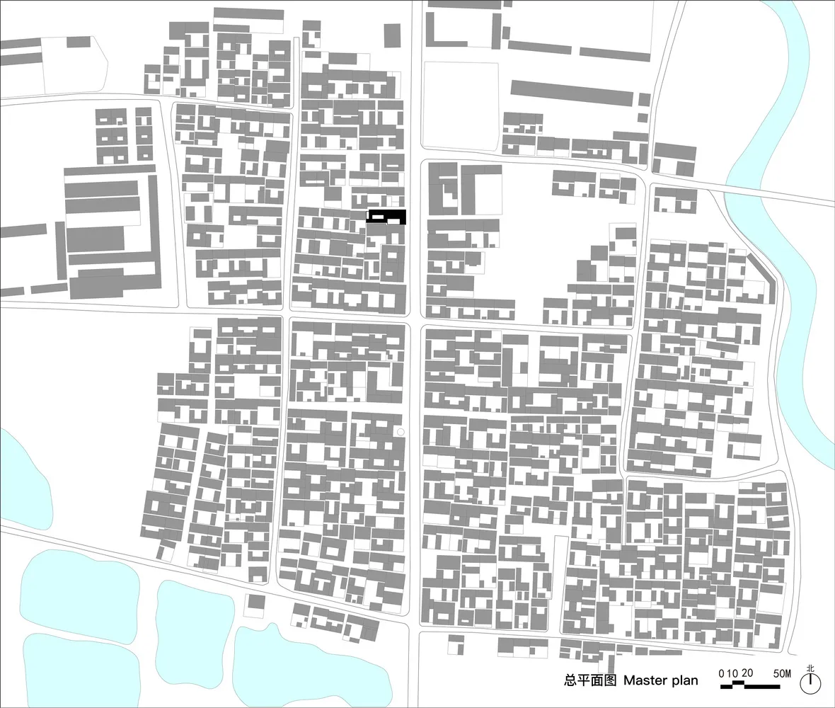 Urban design layout with a grid pattern and various building blocks.