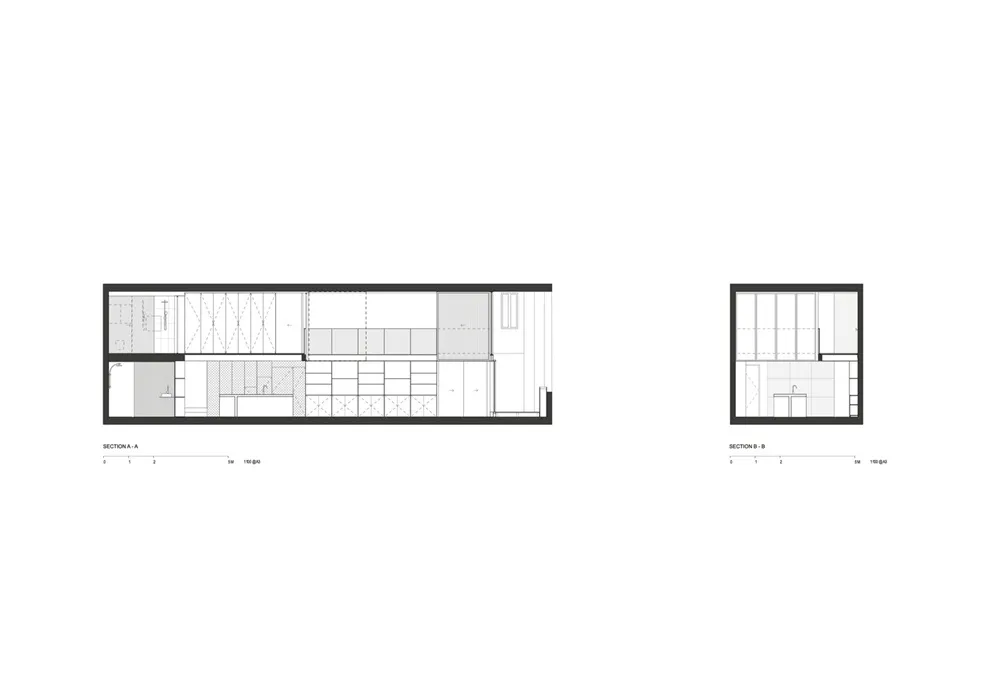 A minimalist kitchen layout featuring modern design principles, with clean lines and a cohesive color palette.