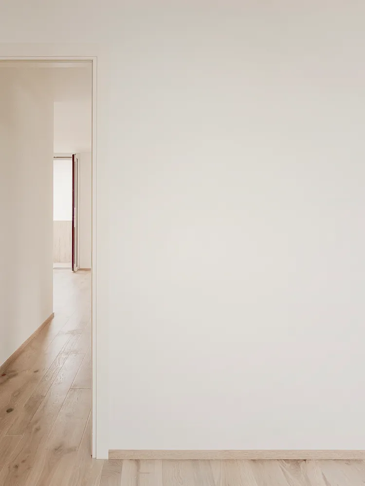 A minimalist wall interior with neutral colors and clean lines.