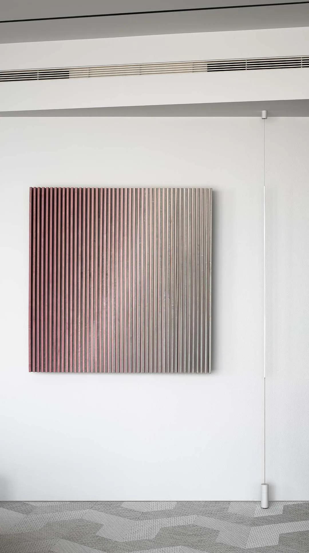 A minimalist abstract panel made of wood.