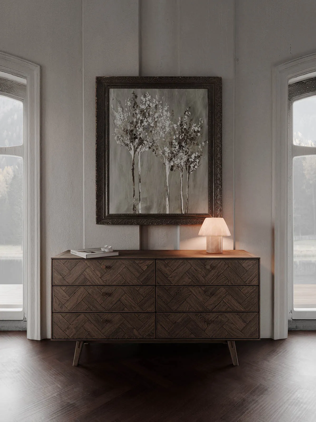 A mid-century modern dresser made of wood with six drawers, placed in a living room with a framed painting of trees and a tab