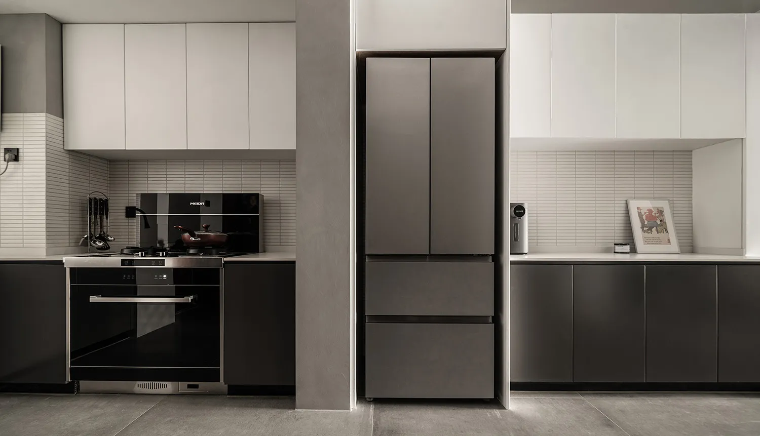 A modern minimalist kitchen featuring composite panels with sleek, clean design and efficient use of space.