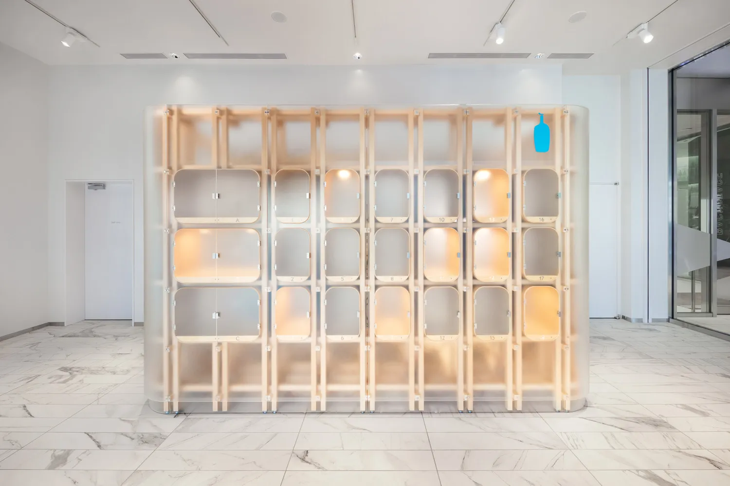 Minimalist storage solution featuring transparent plastic and wooden materials.