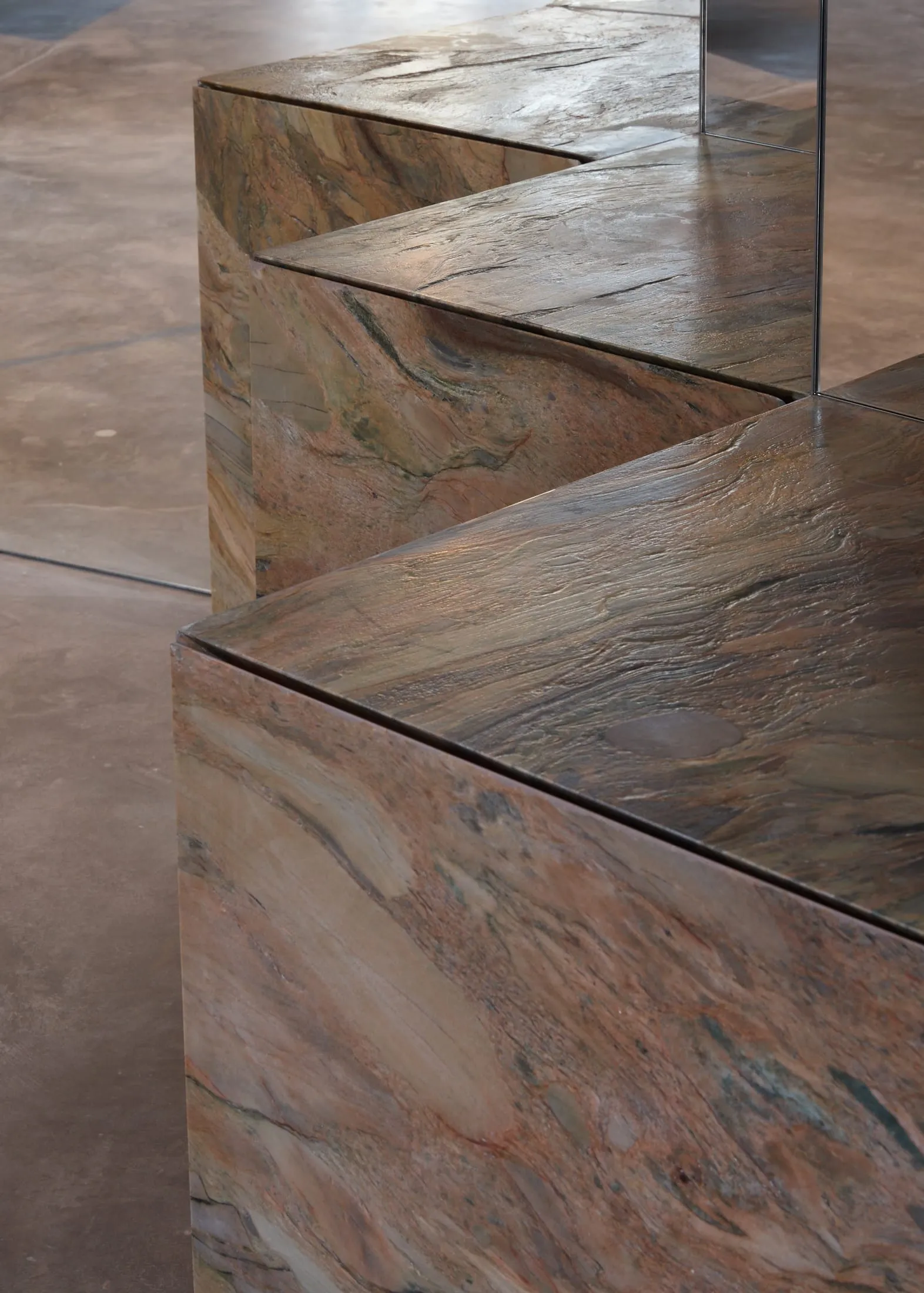 A modern marble countertop with a polished stone slab, giving an elegant and luxurious appearance