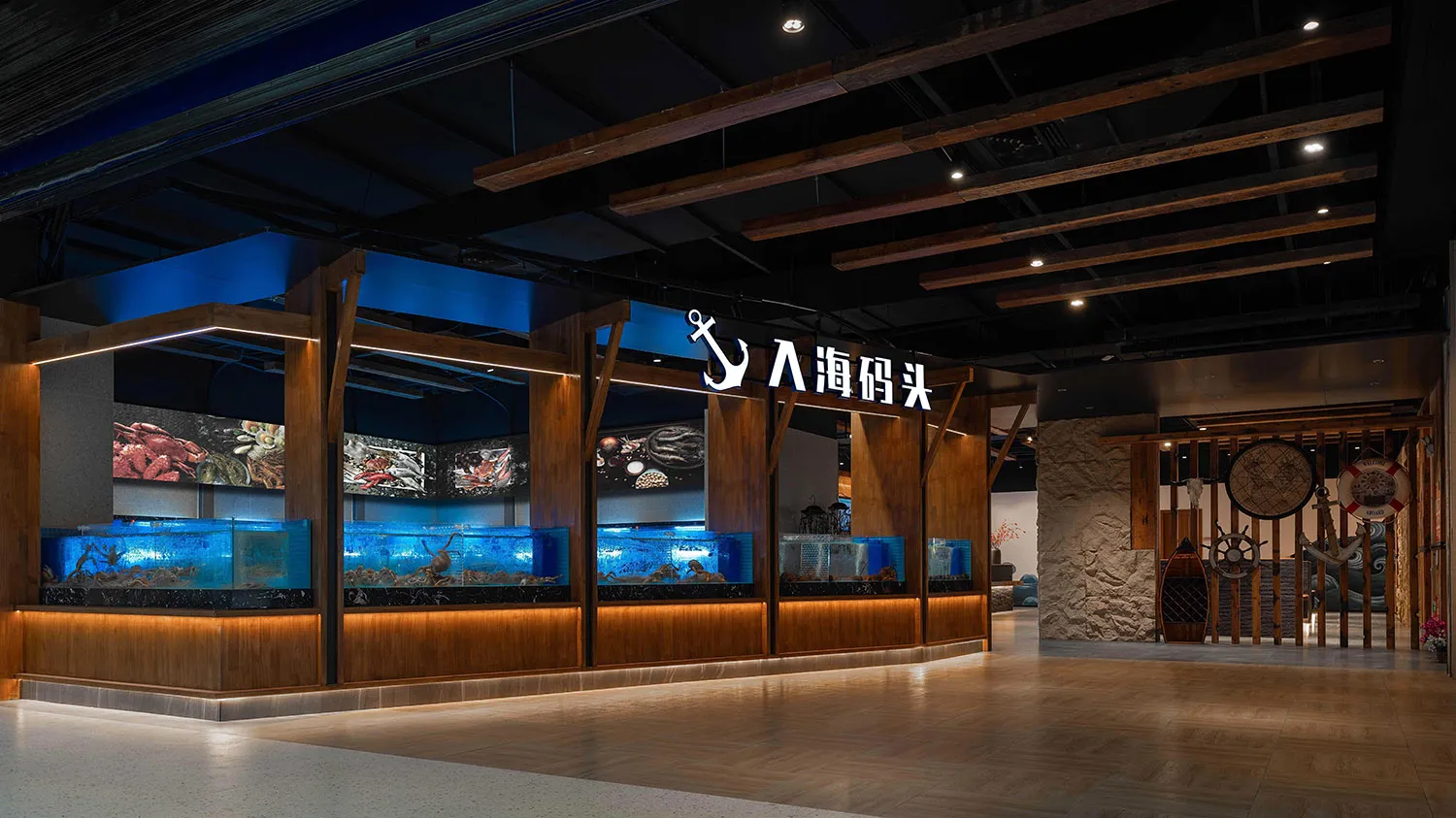 An aquarium store with a wooden design, featuring a large display of fish in tanks, creating a relaxing and enjoyable atmosphere