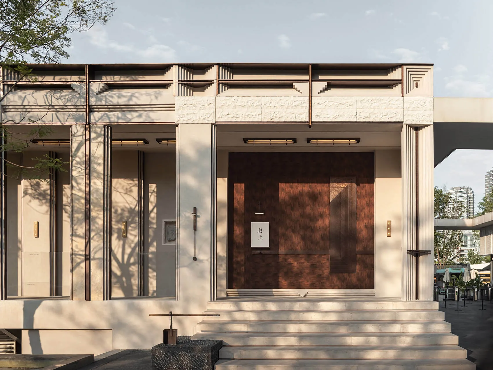 A modern house with a large doorway leading to a staircase, featuring a wooden frame and a sense of elegance and sophistication