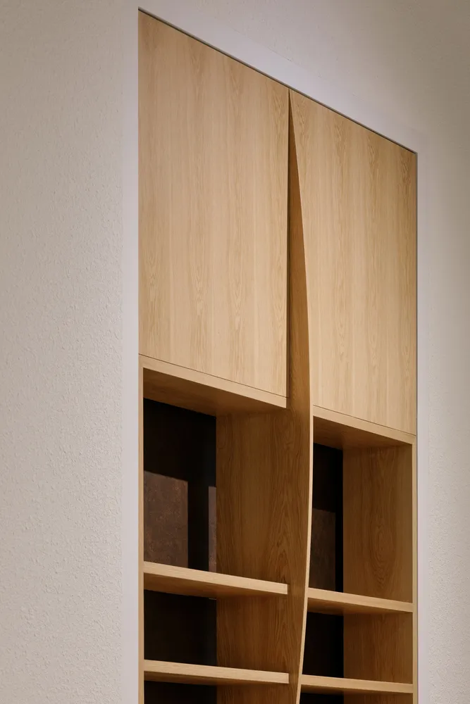 Two modern wooden cabinets with open doors and drawers, providing ample storage space with a warm and natural appearance