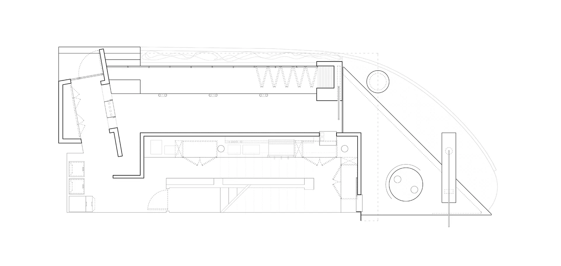 Black and white floor plan of a traditional building with a dining table in one corner, featuring linework, labels, and a classic timeless appearance
