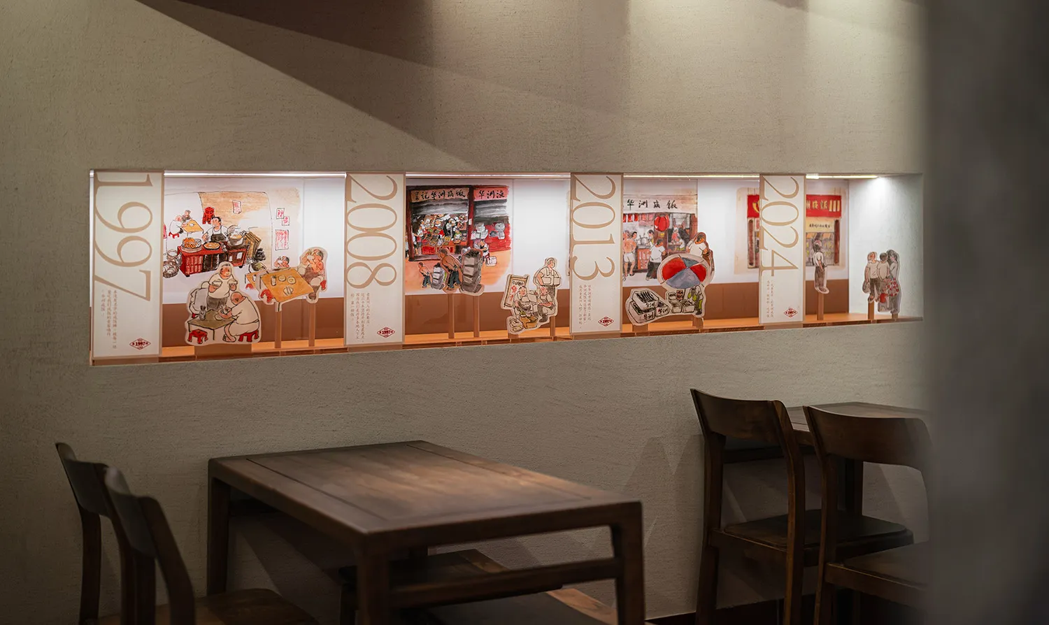 Warm and inviting restaurant interior with wooden tables and chairs, multiple dining tables and chairs, and a focus on comfort
