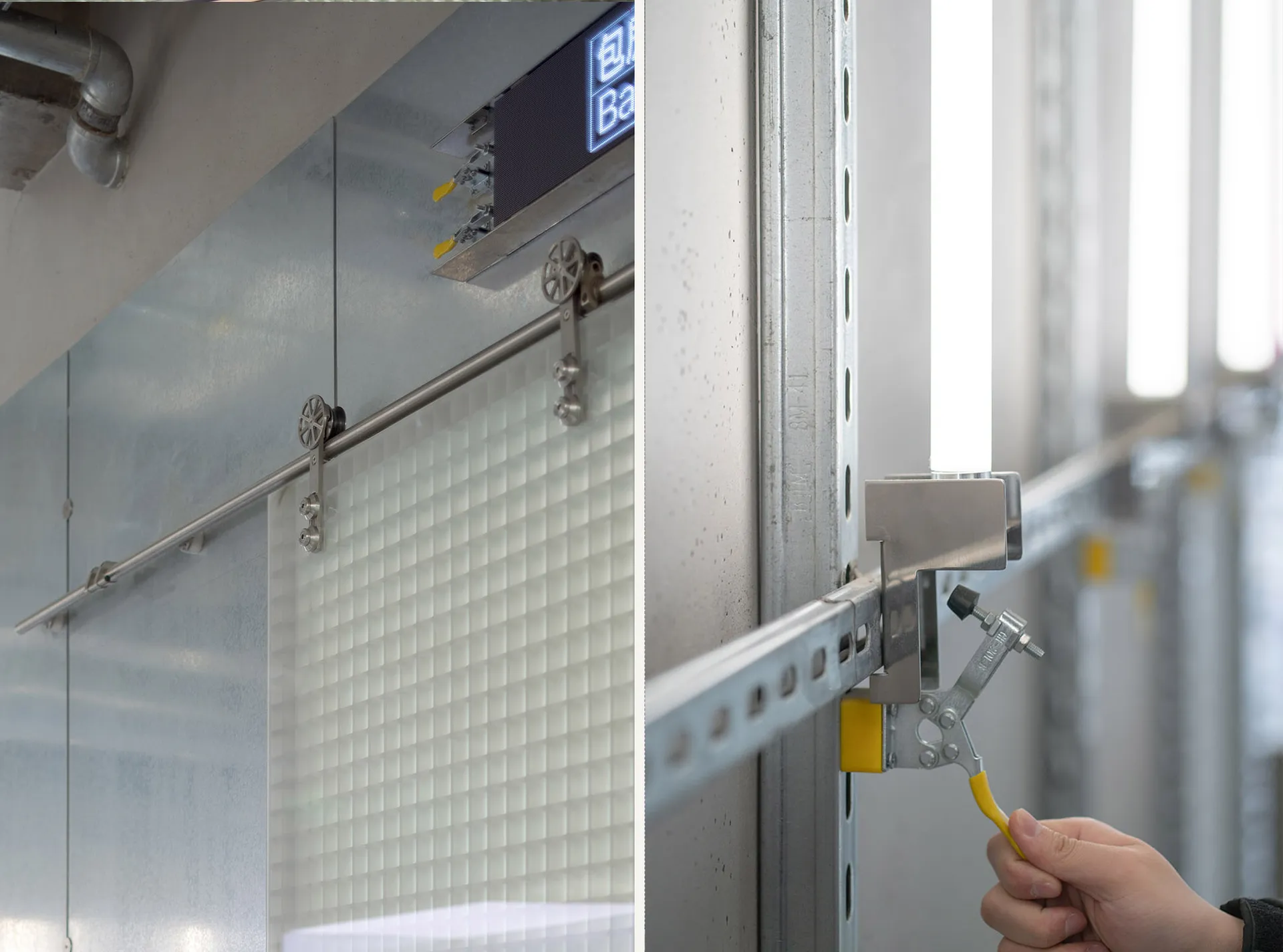 Bathroom with glass walls, metal rack, and metal wall, featuring a combination of glass and metal elements in a well-lit space
