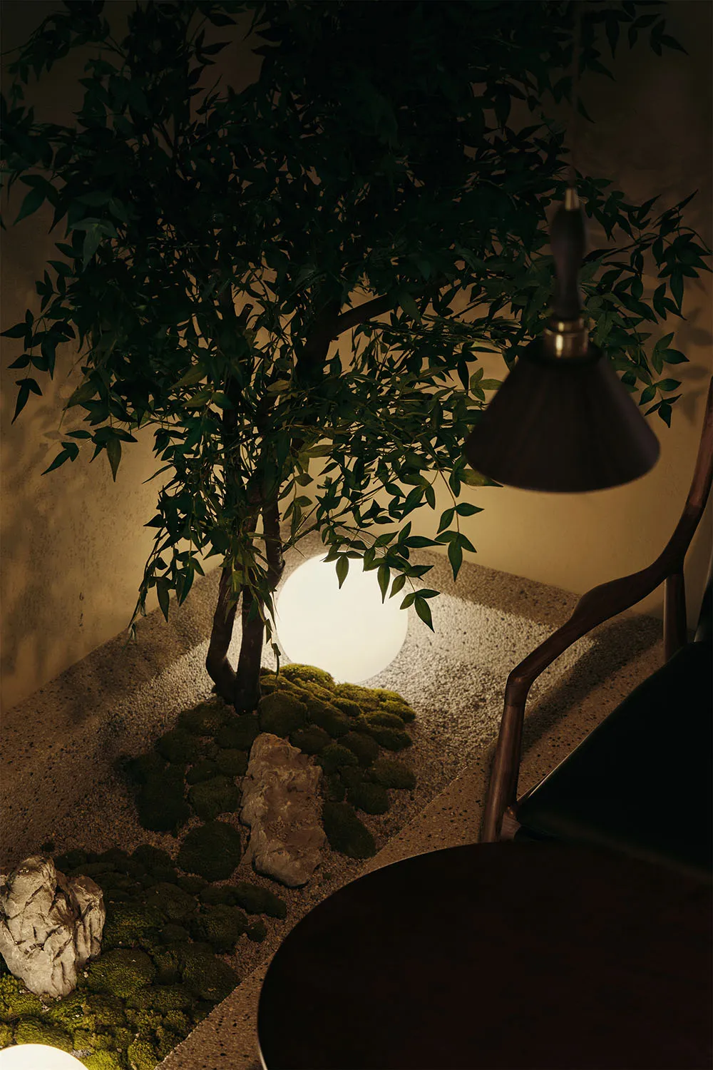 A cozy indoor space with a potted tree, two chairs, and a dining table, featuring a rocky surface and natural elements