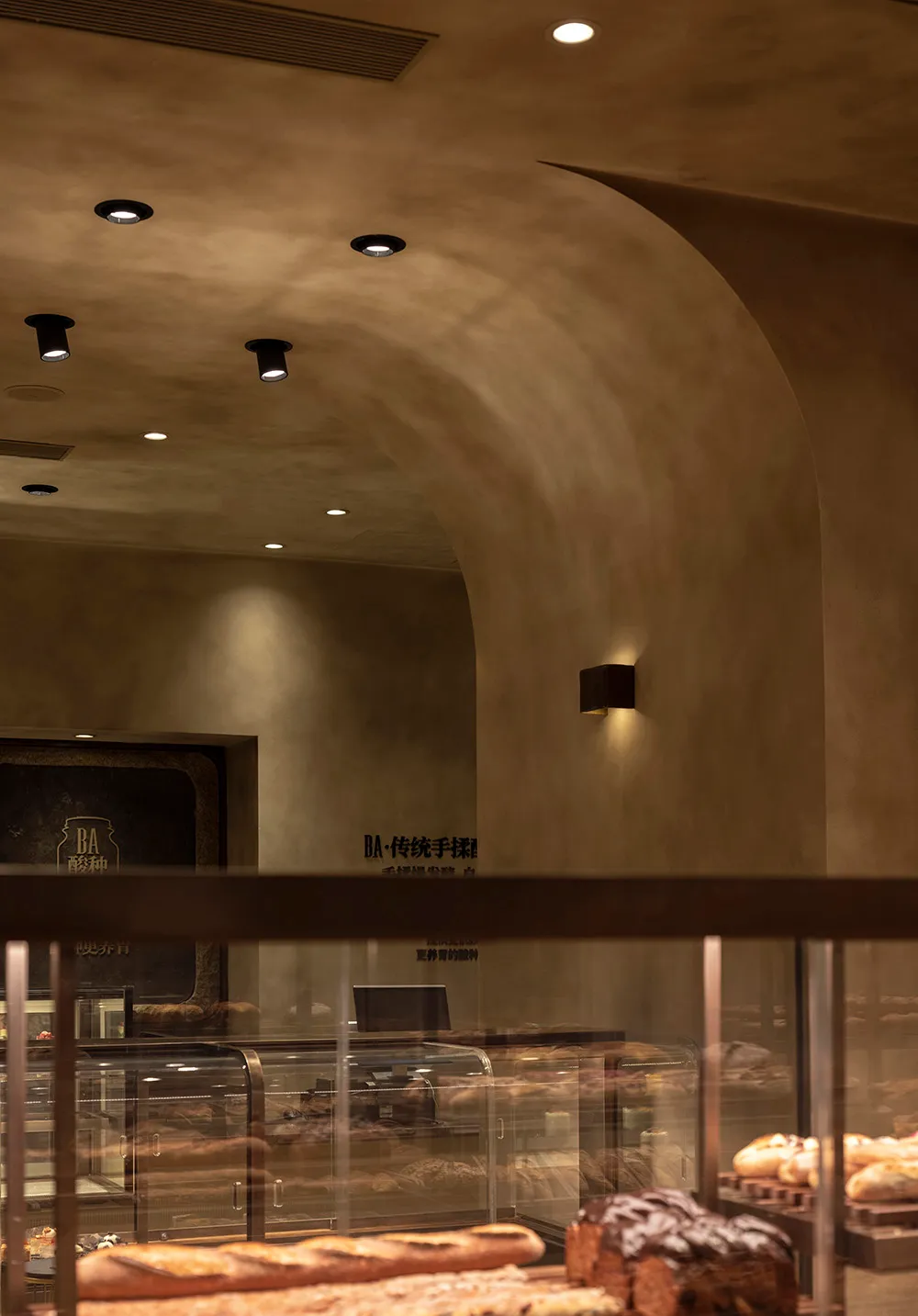 A cozy dining area in a Chinese restaurant with multiple tables and chairs, creating a welcoming atmosphere for guests
