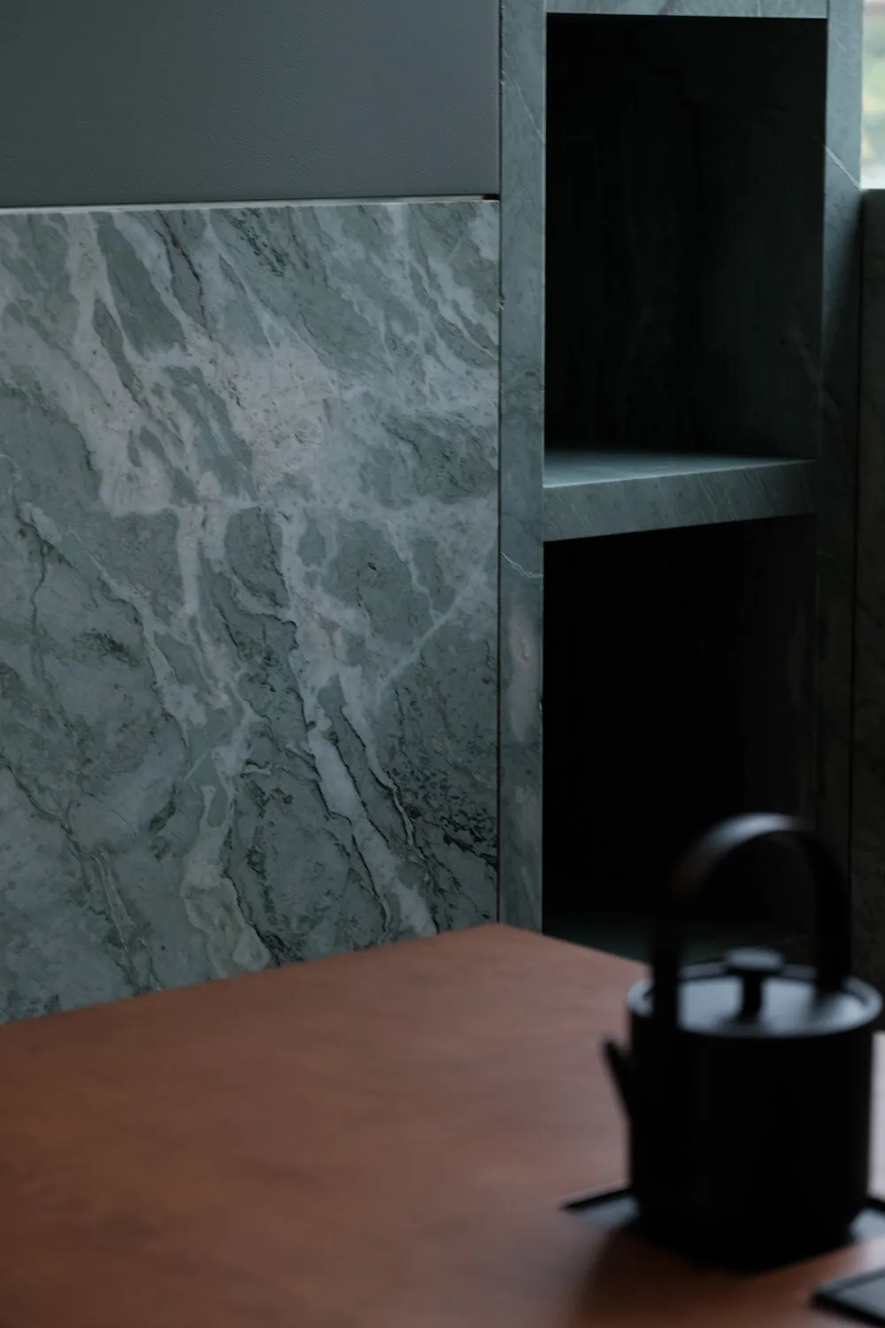 Marble bathroom with dual sinks, marble countertop, and elegant design