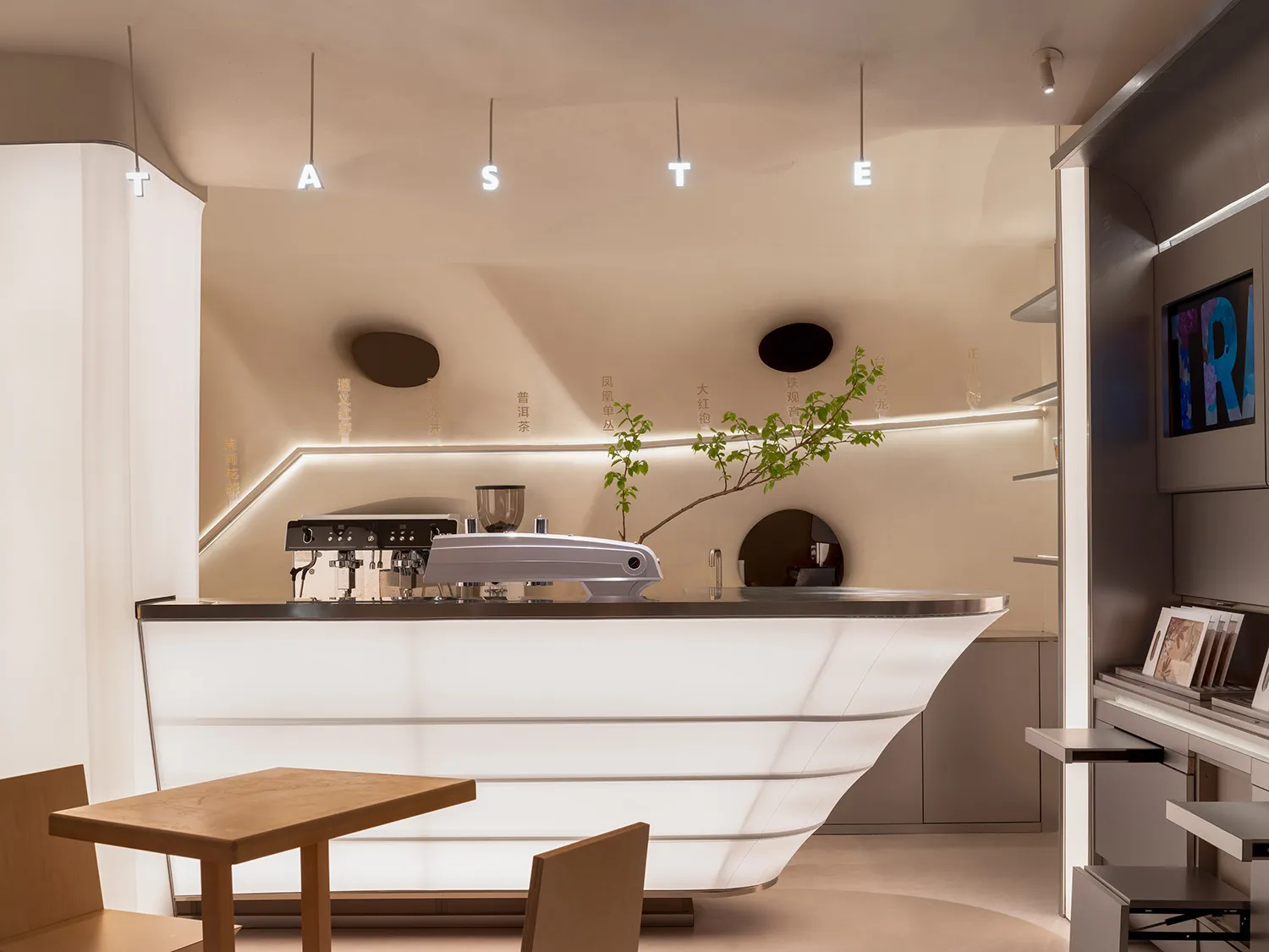 Sophisticated restaurant bar with a modern counter, two chairs, and various items on display, set in a well-lit environment