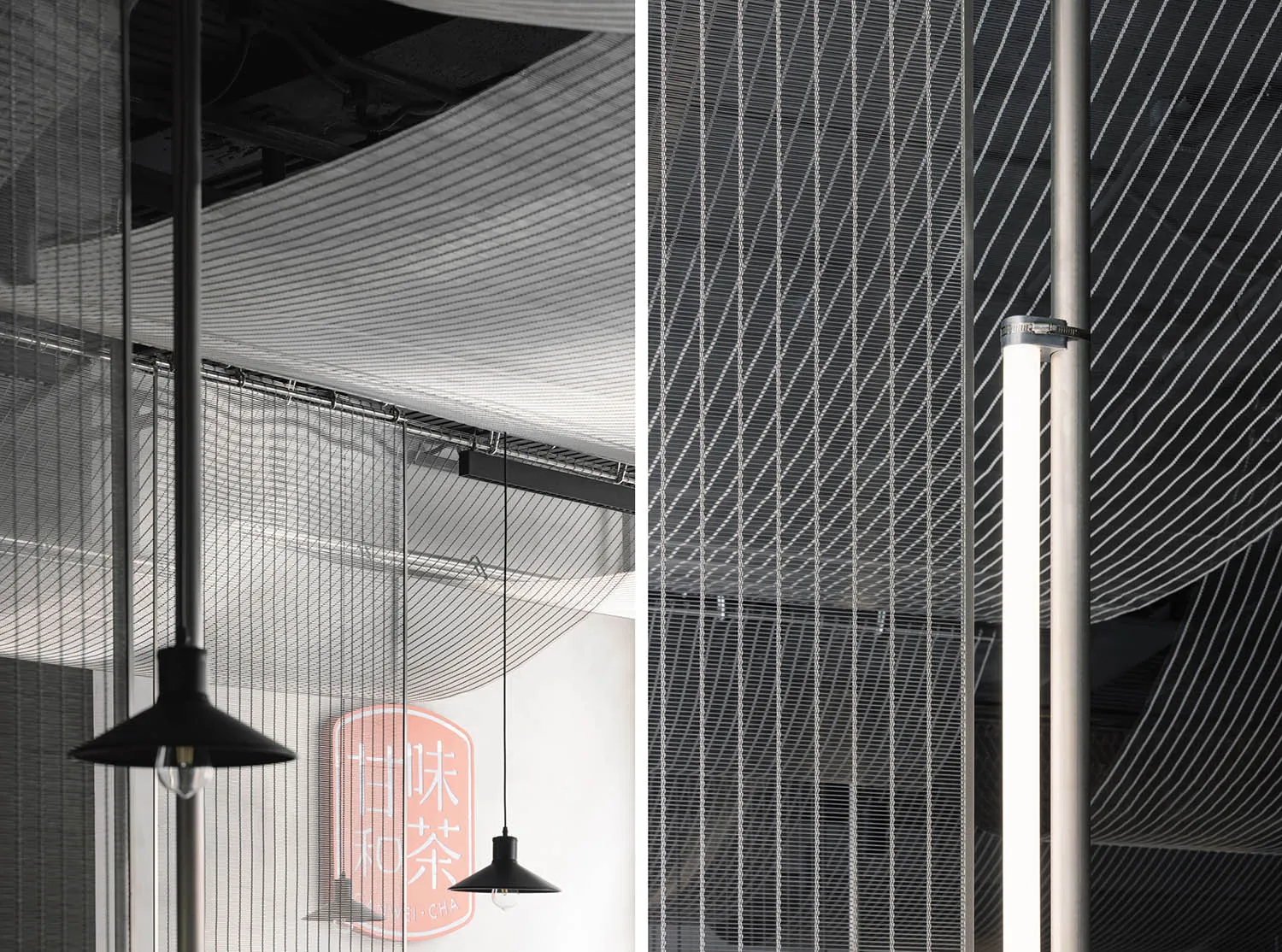 A modern indoor space with a metal mesh wall separating two rooms, adorned with Asian lettering, and a focus on openness and minimalistic elements