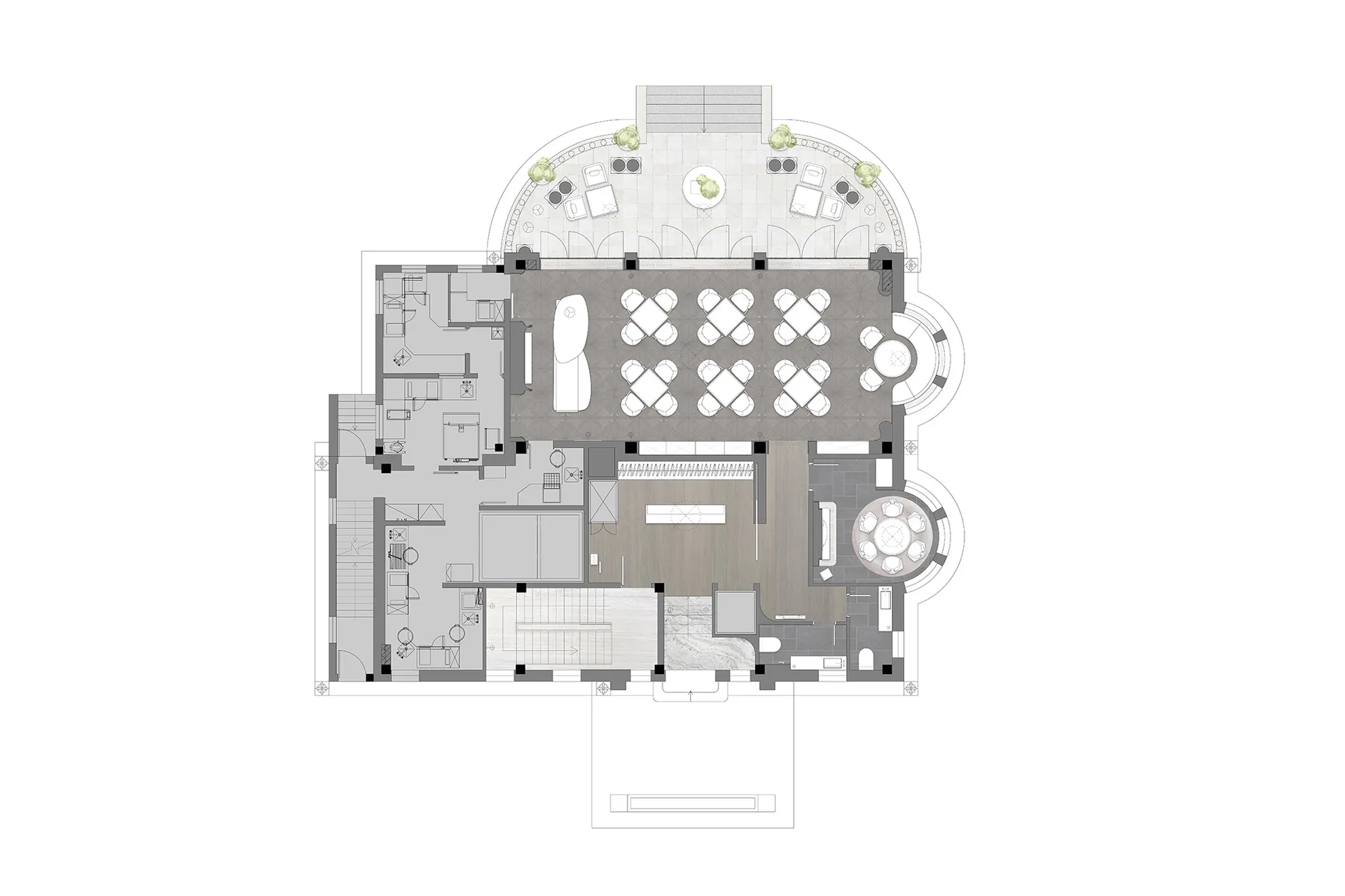 A hotel lobby with multiple seating areas, dining tables, chairs, and potted plants, creating a welcoming atmosphere