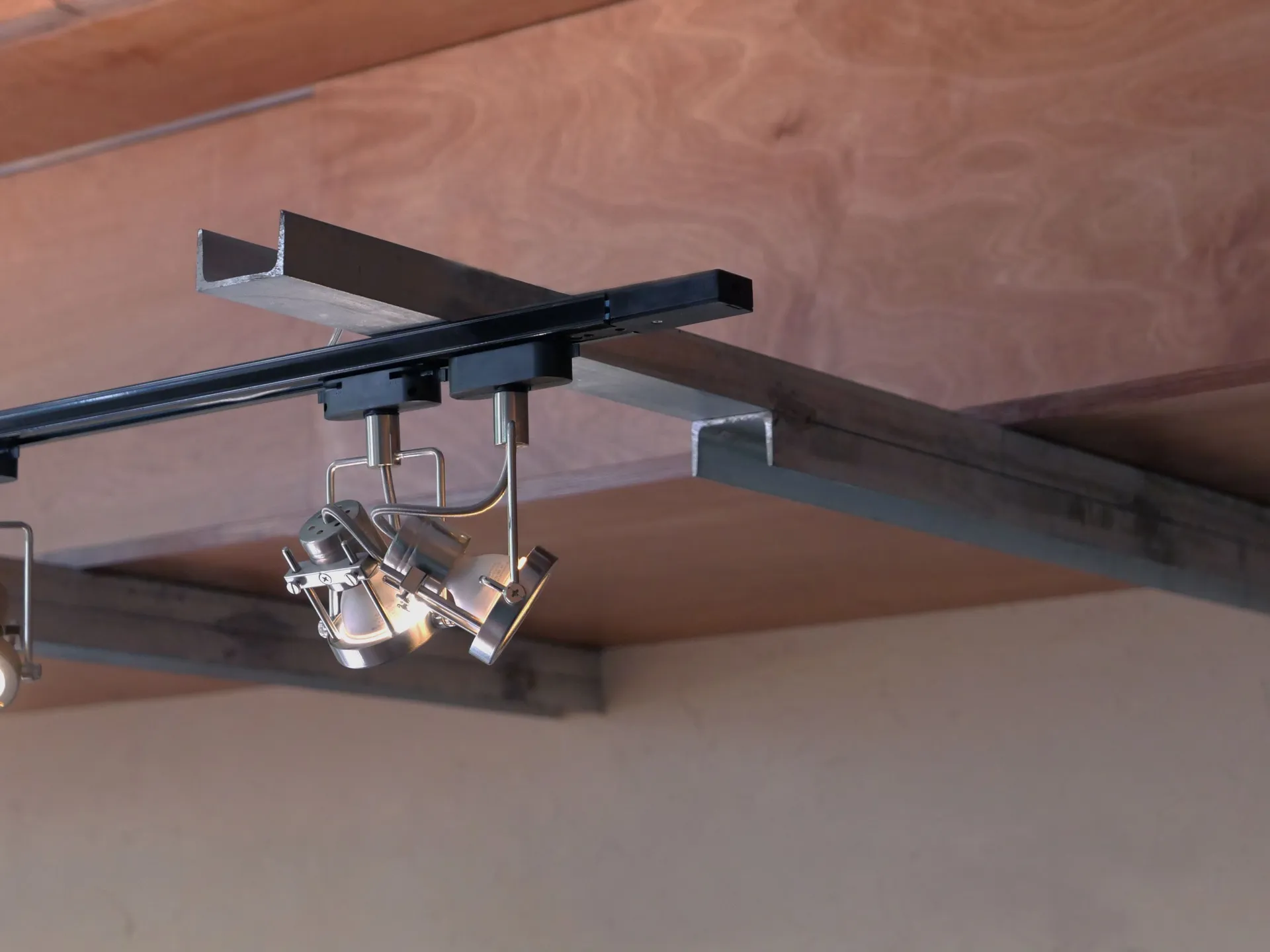 Overhead view of a modern building interior with a metal light fixture and a sense of functionality