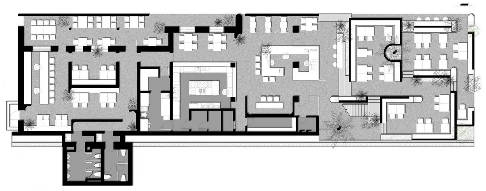 現代建築室內的 2D 平面圖，包含多張椅子與實用配置