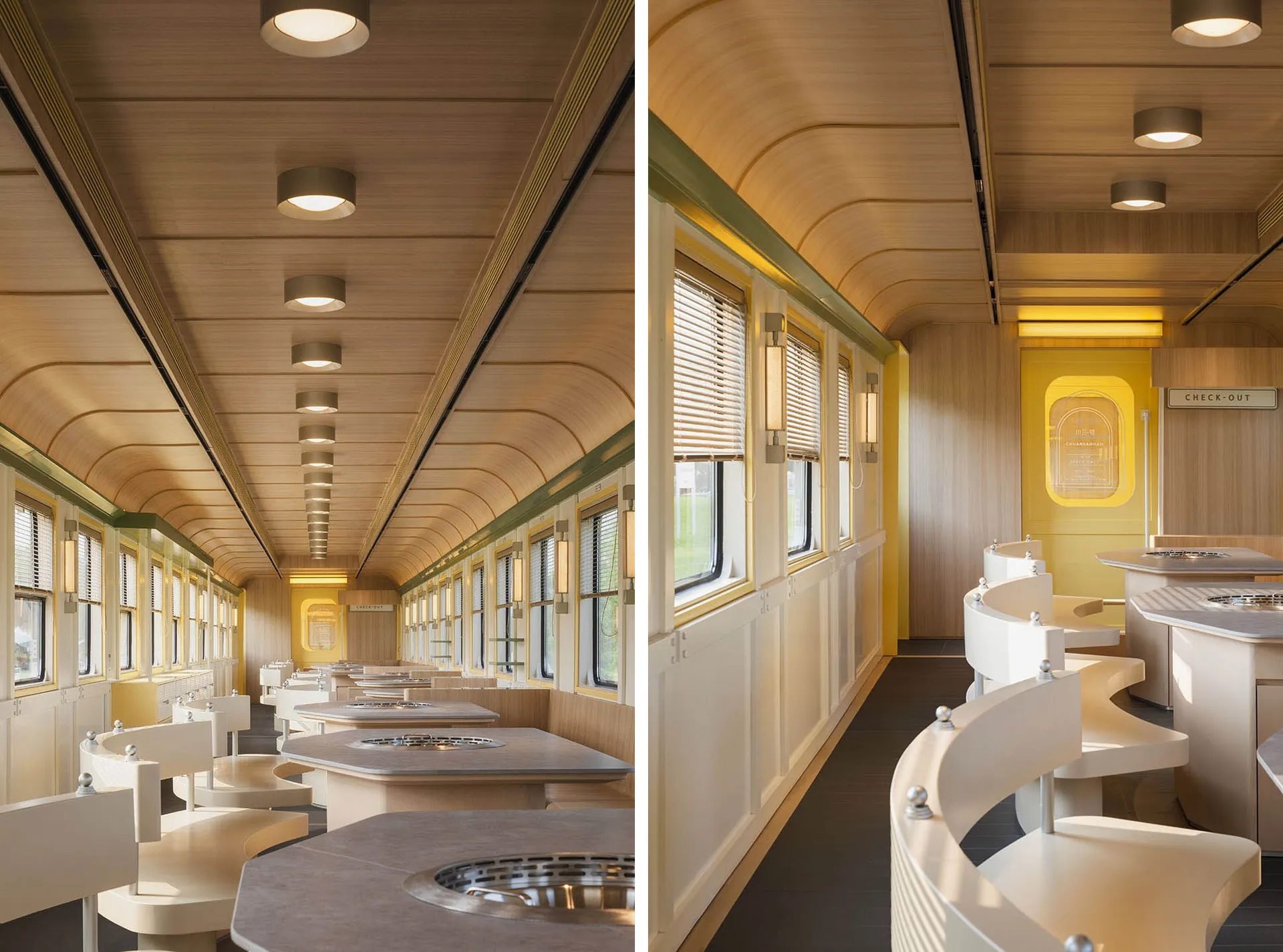 Modern train car dining area with multiple tables and chairs, decorative items, and a comfortable atmosphere